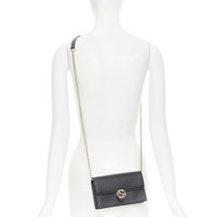 GUCCI Small Dollar black gold interlocking GG crossbody clutch wallet on chain