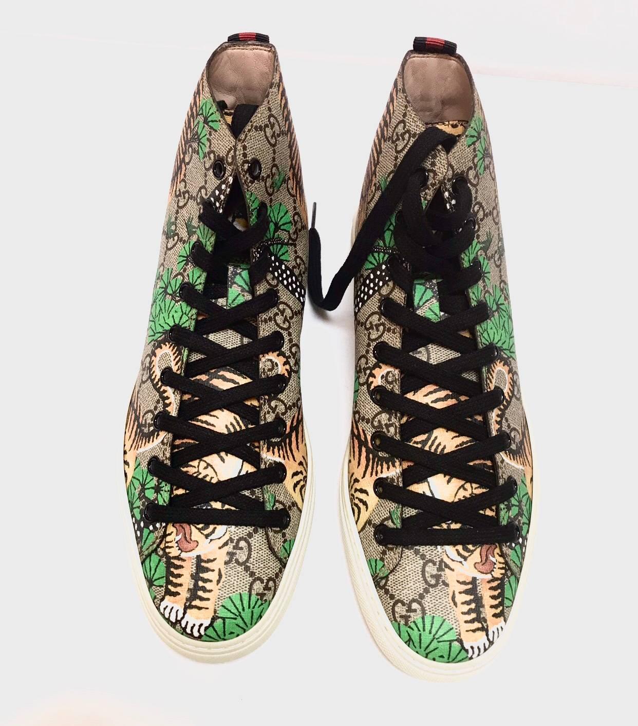 GUCCI 
Season Fw 17

Gucci is approaching the oriental world proposing a beige / ebony GG Supreme sneakers with patterned print with tigers. Rubber sole.
NEW CONDITION 
PACKAGING: ORIGINAL BOX AND DUST BAG 
DELIVERY: DHL EXPRESS
