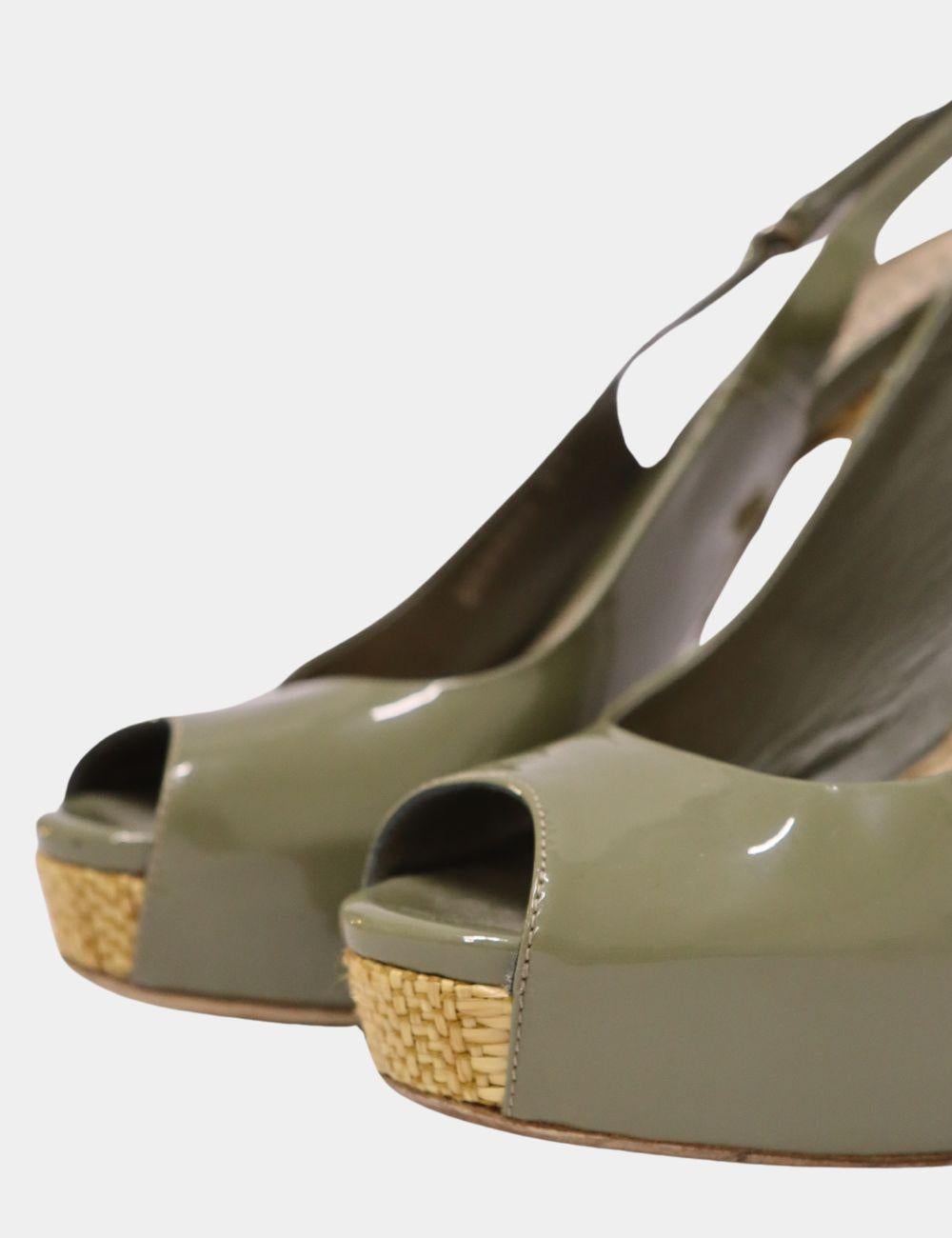 Gucci Sofia Peep Toe Raffia Slingback Sandals, features peep toe and patent leather.

Material: Leather
Size: EU 37
Heel Length: 13.5cm
Overall Condition: Fair
Interior Condition:  Signs of use
Exterior Condition: Light scratches and discoloration