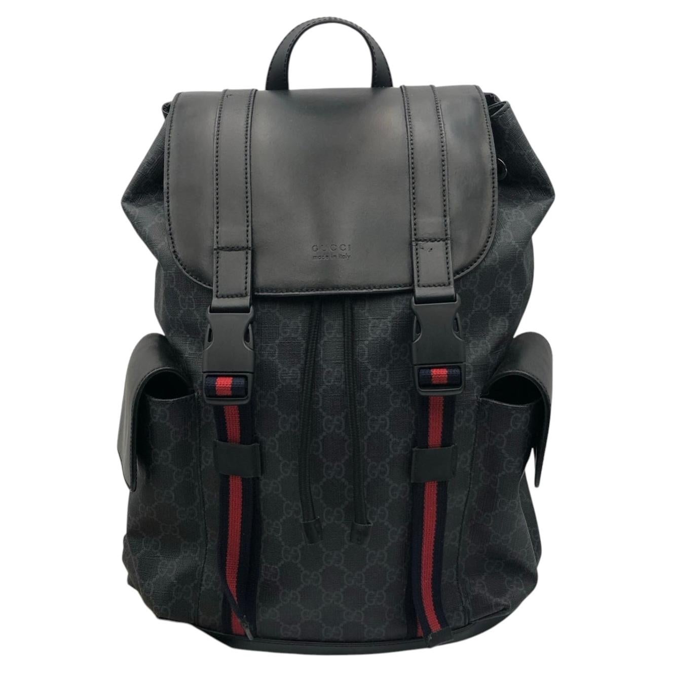 Zaino Gucci in tela GG Supreme morbida nera e pelle, con motivo Web e doppia fibbia