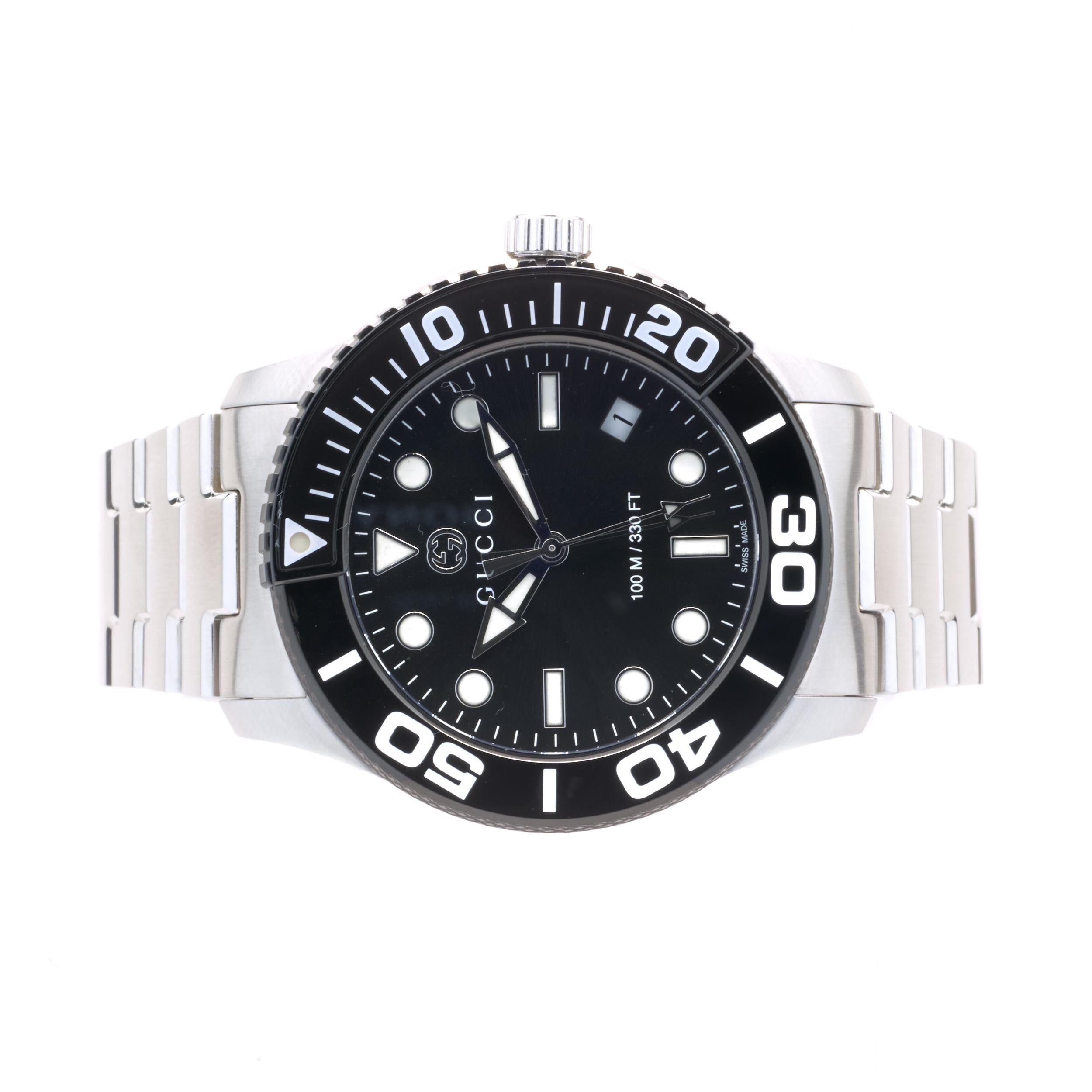 Movement: quartz 
Function: hours, minutes, seconds, date
Case: round 40mm stainless steel case with black rotating, sapphire crystal, pull/push crown
Band: stainless steel link bracelet with butterfly clasp
Dial: black dot dial
Serial #: