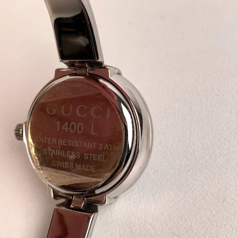 Gucci Stainless Steel Wrist Watch Mod 1400L Quartz Wrist Watch Black Dial For Sale at 1stDibs