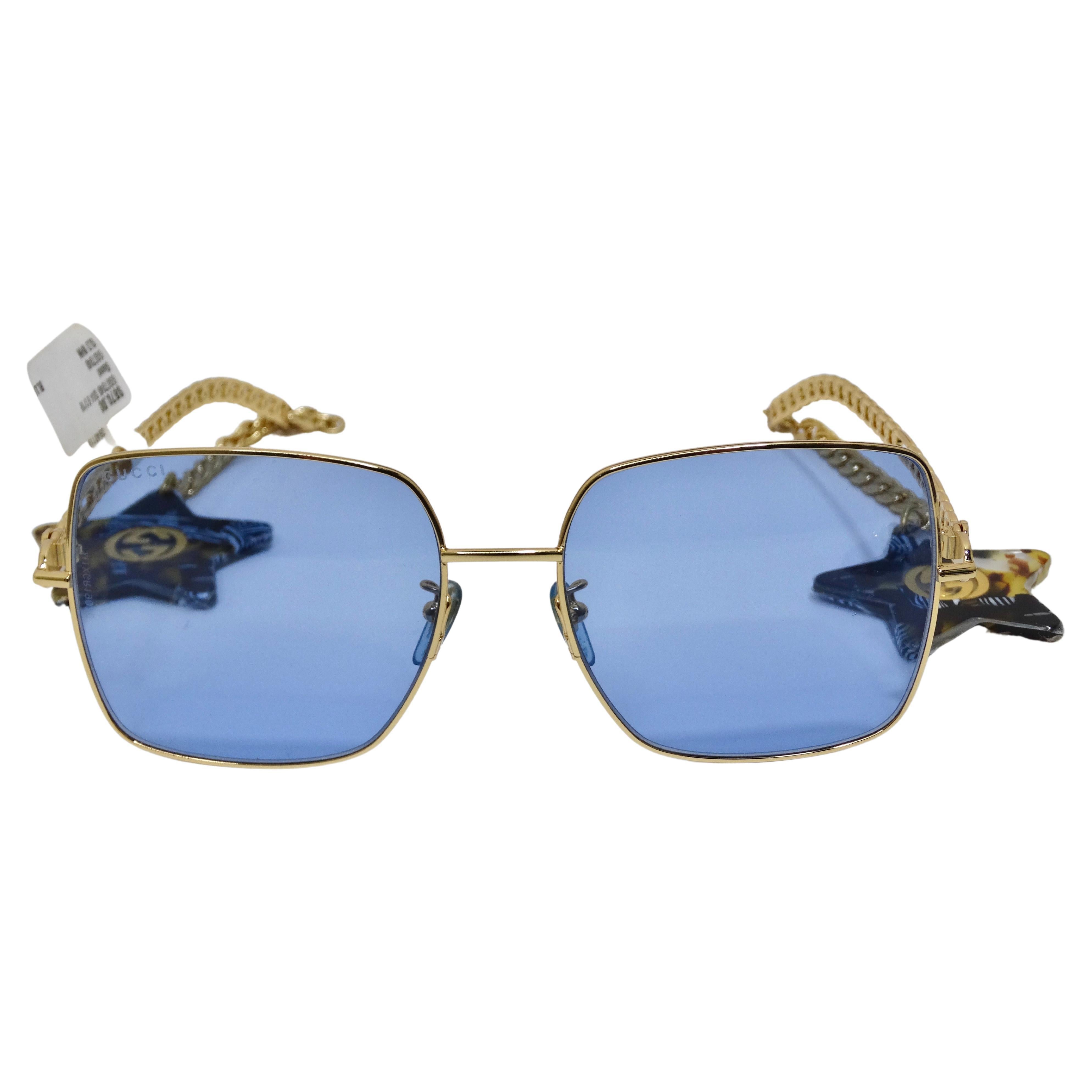 Blaue und goldene Gucci-Sonnenbrille mit Sternanhänger