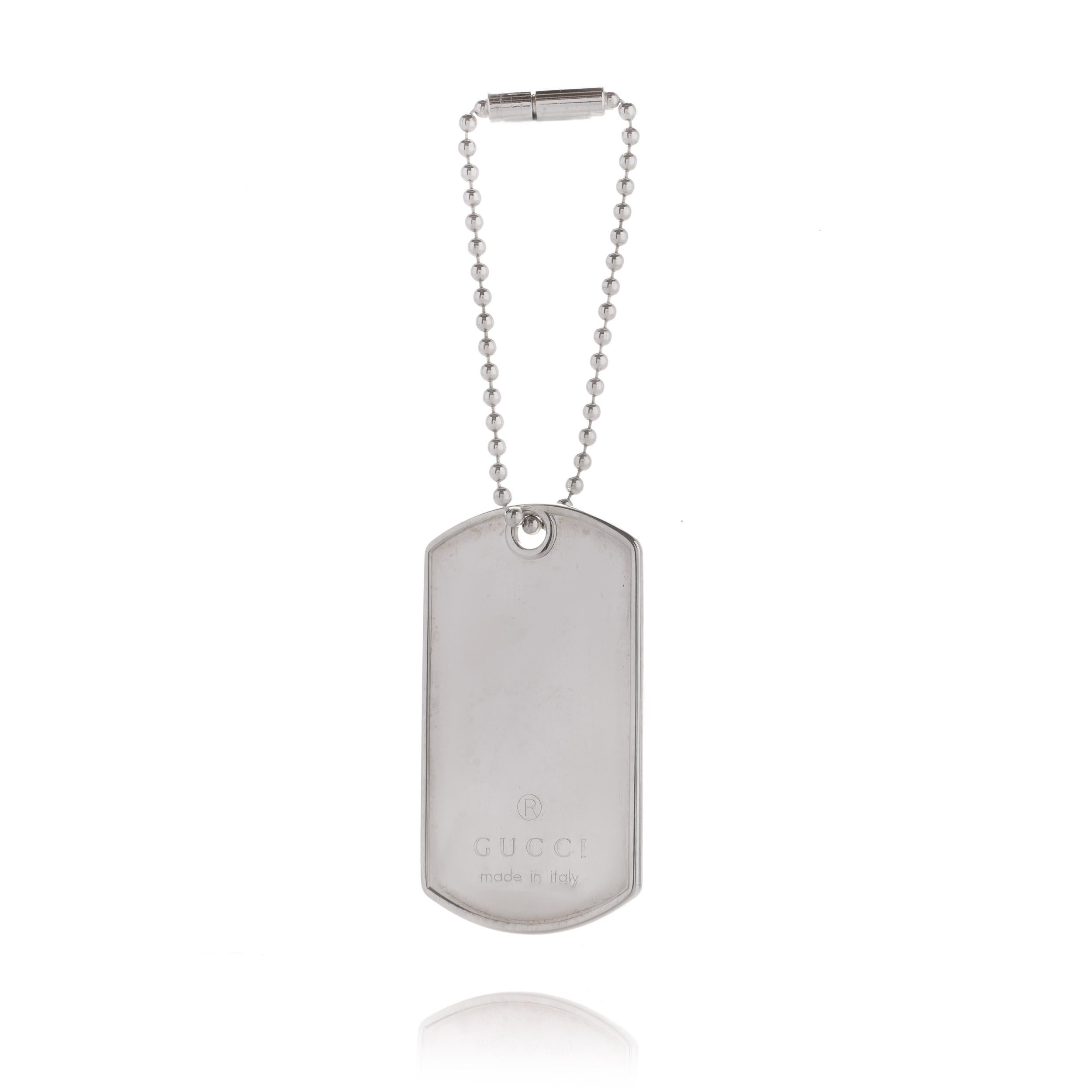 Gucci Sterling 925 Silver Dog Tag Pendant/ Bag charm. 
Designer / Maker: Gucci
Made in Italy, After 2000
Hallmarked with Gucci logo, 925 silver, Italian hallmarks. 

Dimensions -
Chain length: 12.1 cm
Tag Pendant size: Length x width x depth: 4.9 x
