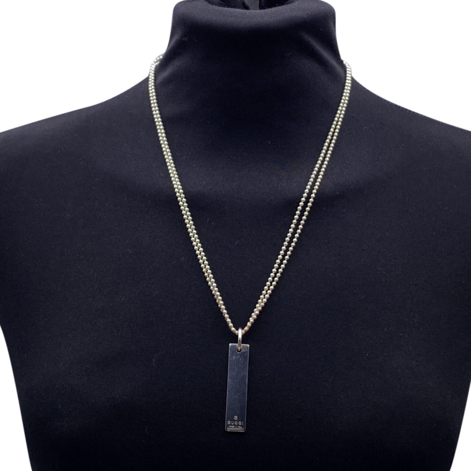 Classic unisex double ball chain necklace by Gucci. Made in sterling silver. Rectangular bar logo tag pendant. Lobster closure. Total length of the chain: 20 inches - 50.8 cm . Pendant height: 1.75 inches - 4.5 cm. 'Gucci - made in Italy' engraved