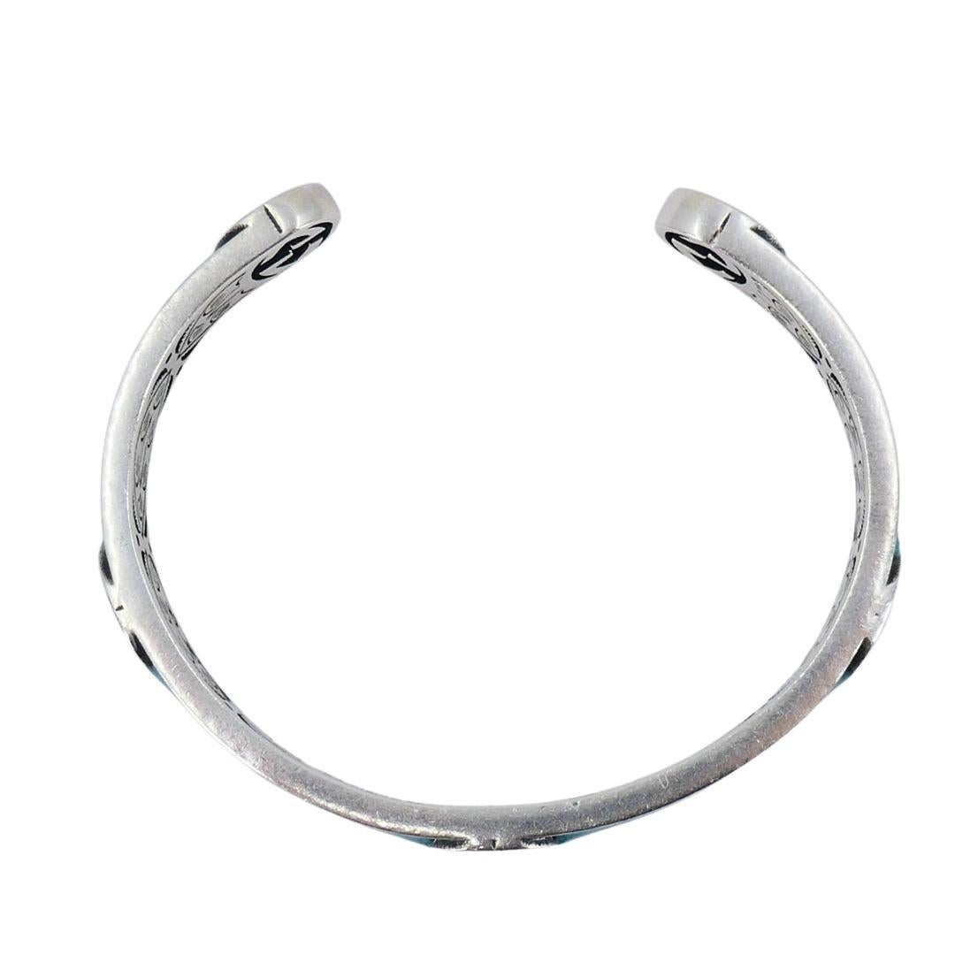 Brazalete Gucci de plata de ley con esmalte y una G entrelazada en venta 6