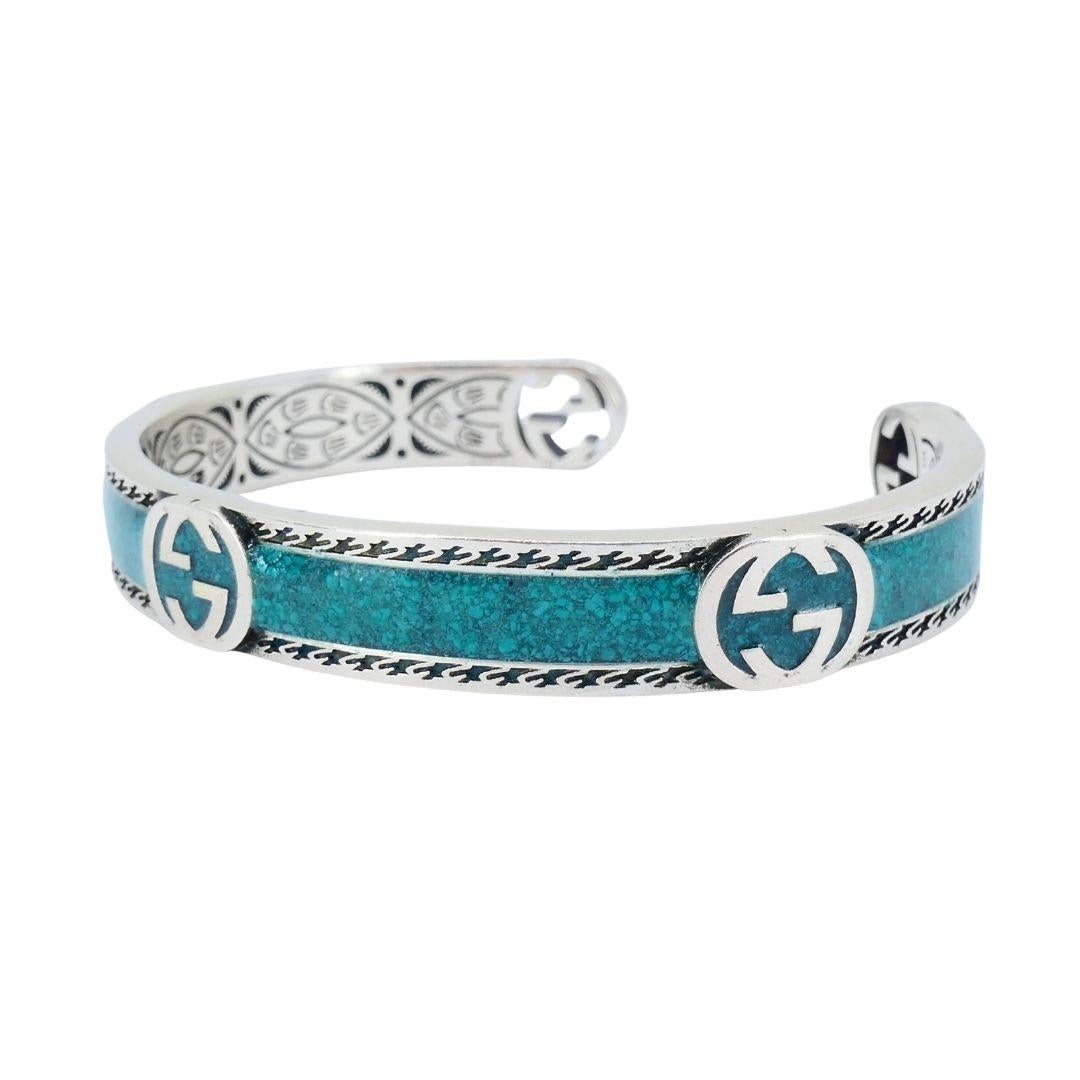 Brazalete Gucci de plata de ley con esmalte y una G entrelazada en venta 1