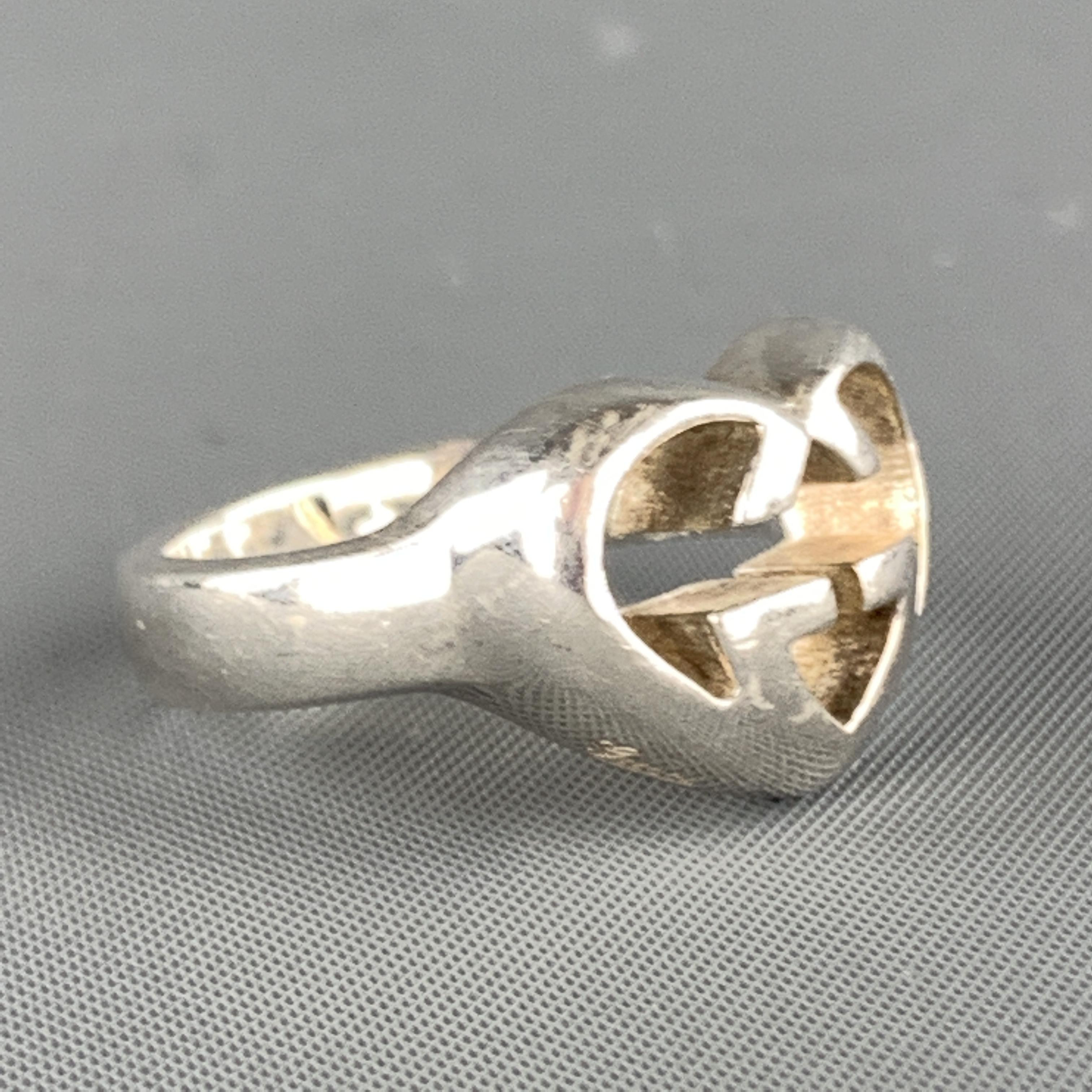 Vintage GUCCI ring comes in sterling silver with heart shaped GG motif. Made in Italy.

Very Good Pre-Owned Condition.

Heart: 1.5 x 1.25 cm.
Fits: Size 9