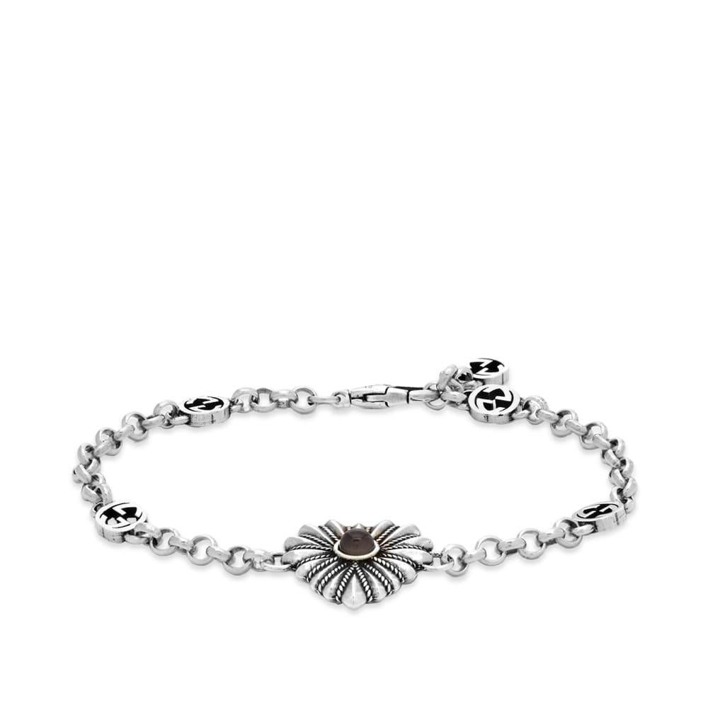 GUCCI STERLING SILVER INTERLOCKER G HEART PENDANT BRACELET

Color: Aged silver / this hardware finish is color Ruthenium
Material: Sterling silver & mother of pearl
Model No. 728478 J8440
Marks: Ag 925 18, Gucci Signature, Made in Italy
Total Item