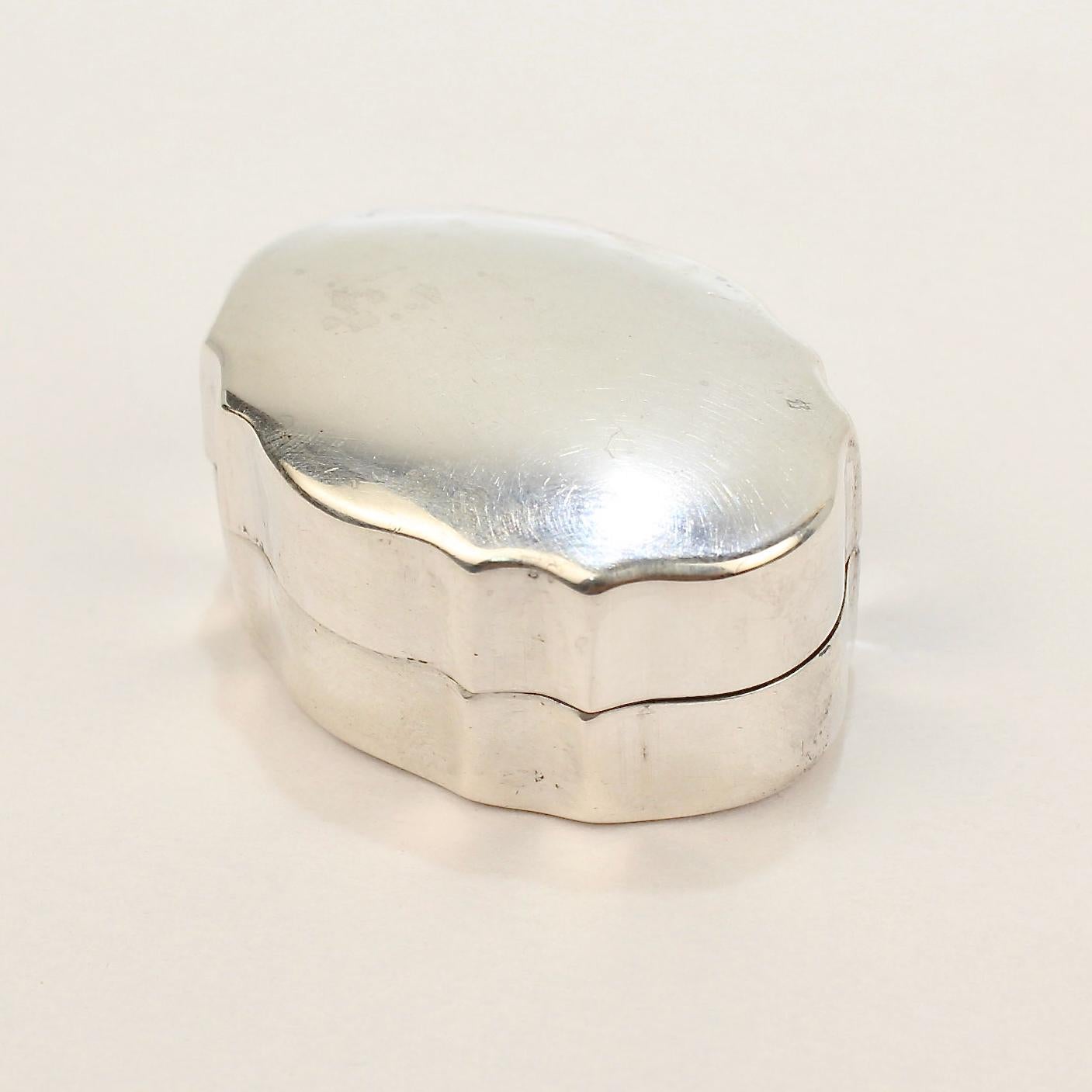 A fine sterling silver pill box by Gucci.

With shaped sides and a tight sealing lid.

Provenance: 
From the collection of the legendary interior decorator - Mario Buatta.

Date:
20th Century

Overall Condition:
It is in overall good, as-pictured,