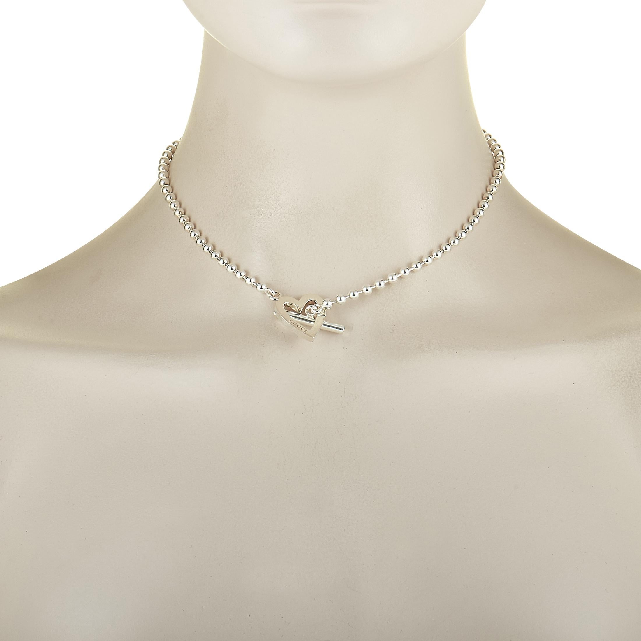 This Gucci necklace is crafted from silver and weighs 24 grams. The necklace boasts a 15” chain and a pendant that measures 0.87” in length and 0.75” in width.
 
 Offered in brand new condition, this jewelry piece includes the manufacturer’s box and