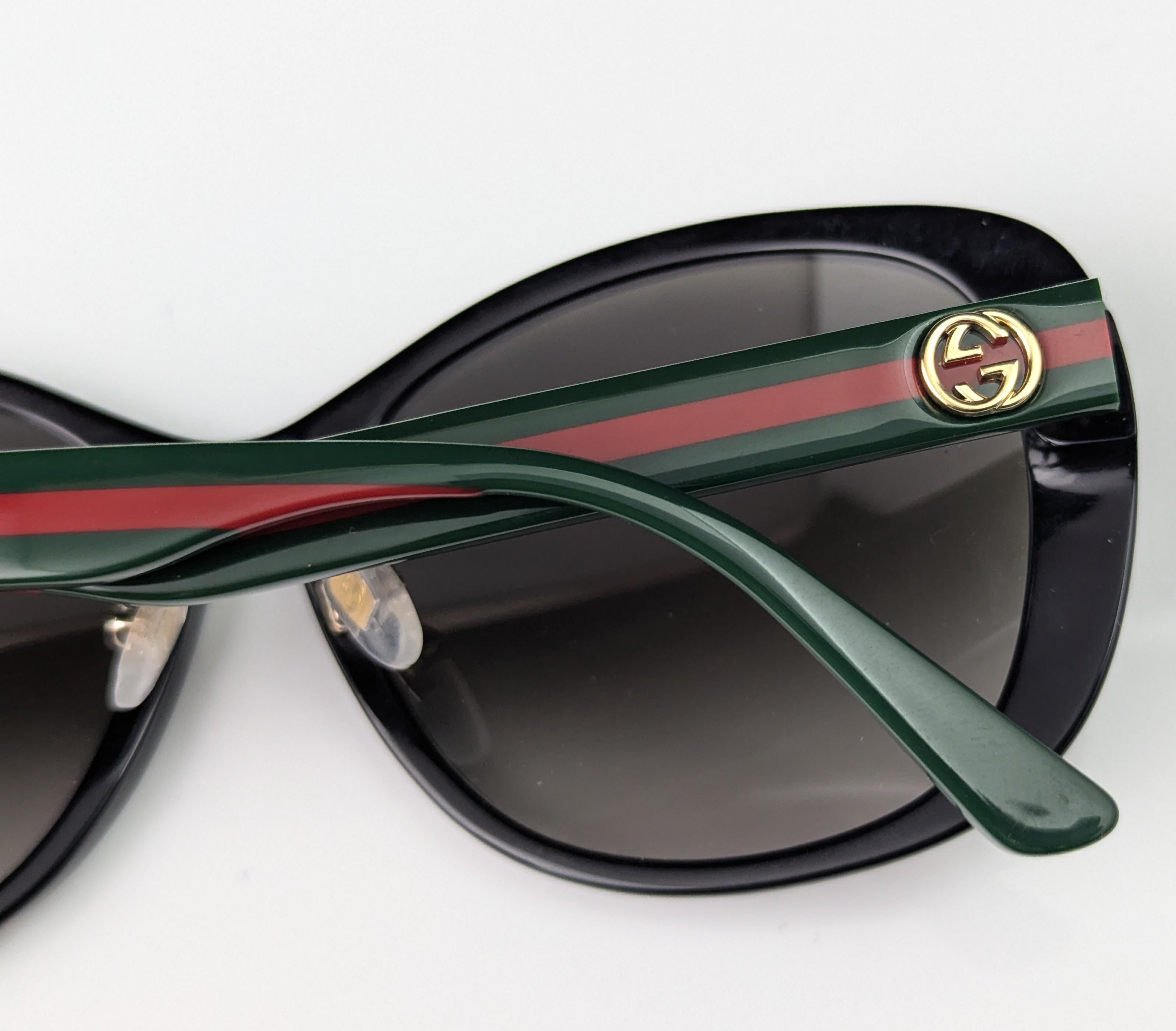 Gafas de sol Gucci Stripe Arm, logotipo GG en venta 1