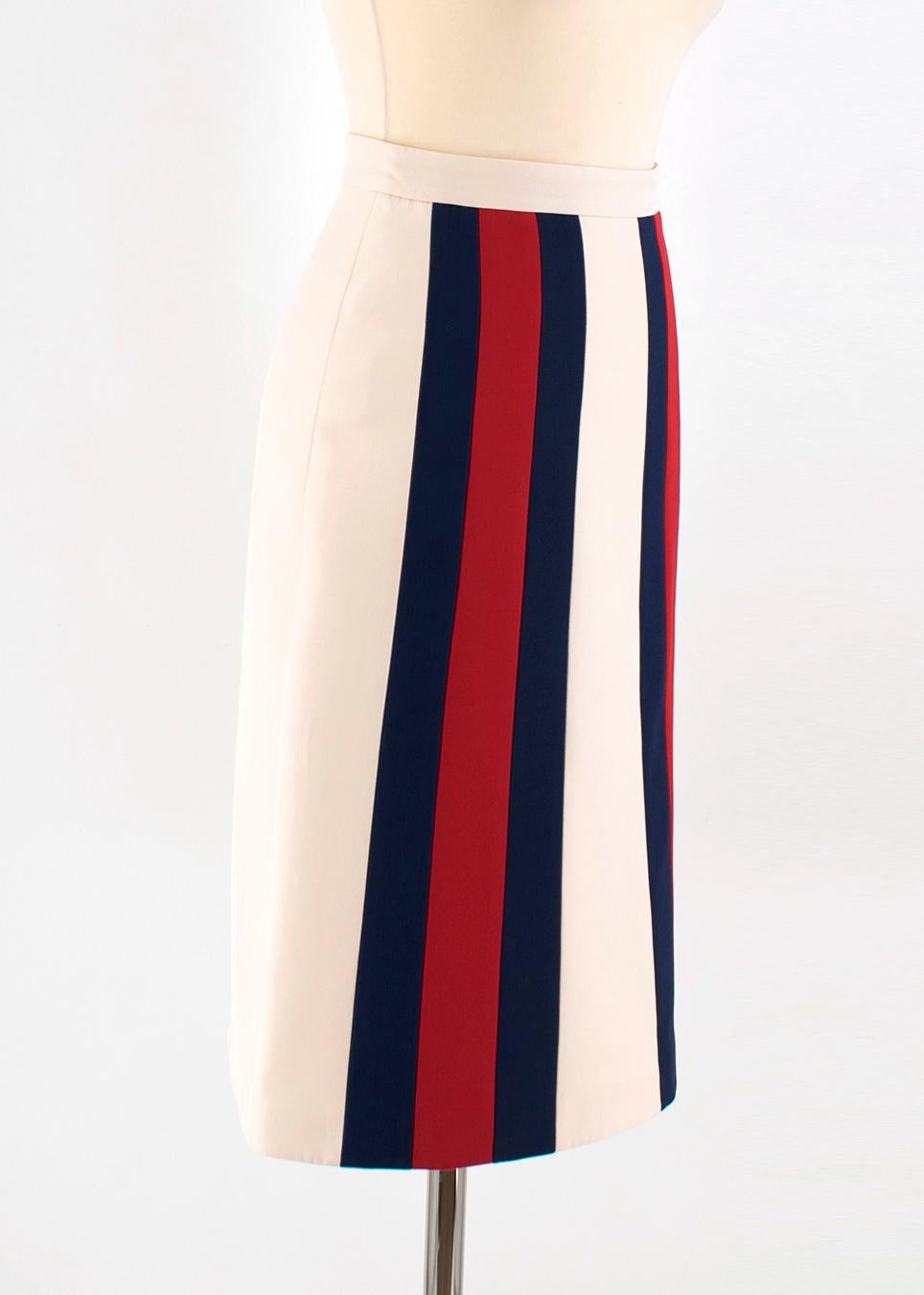 Gucci White Silk & Wool Midi Skirt

- White, lightweight silk & wool midi skirt
- Patterned with Gucci's signature blue and red stripes 
- High-waist, tight on the silhouette
- Zip fastening on the left side
- Main fabric: 51% lana wool and 49%
