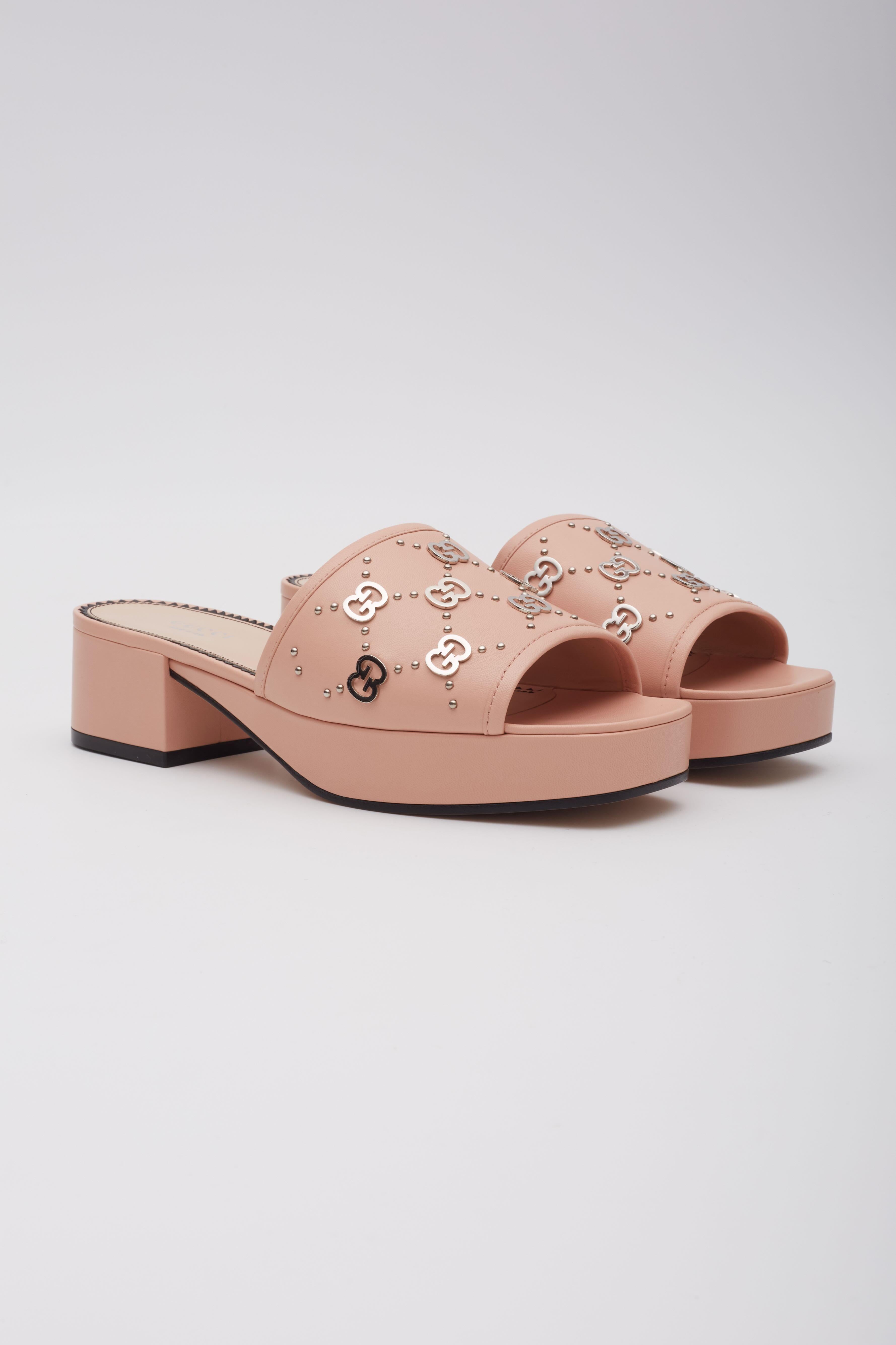 Color: Perfect Pink
Material: calfskin leather with crystal embellishments
Model No. 723427

EU 39.5
Heel Height: 50 mm / 2”
Platform Height: 25 mm / 1”
Condition: New
Comes with: Dust bag and box

Made in Italy