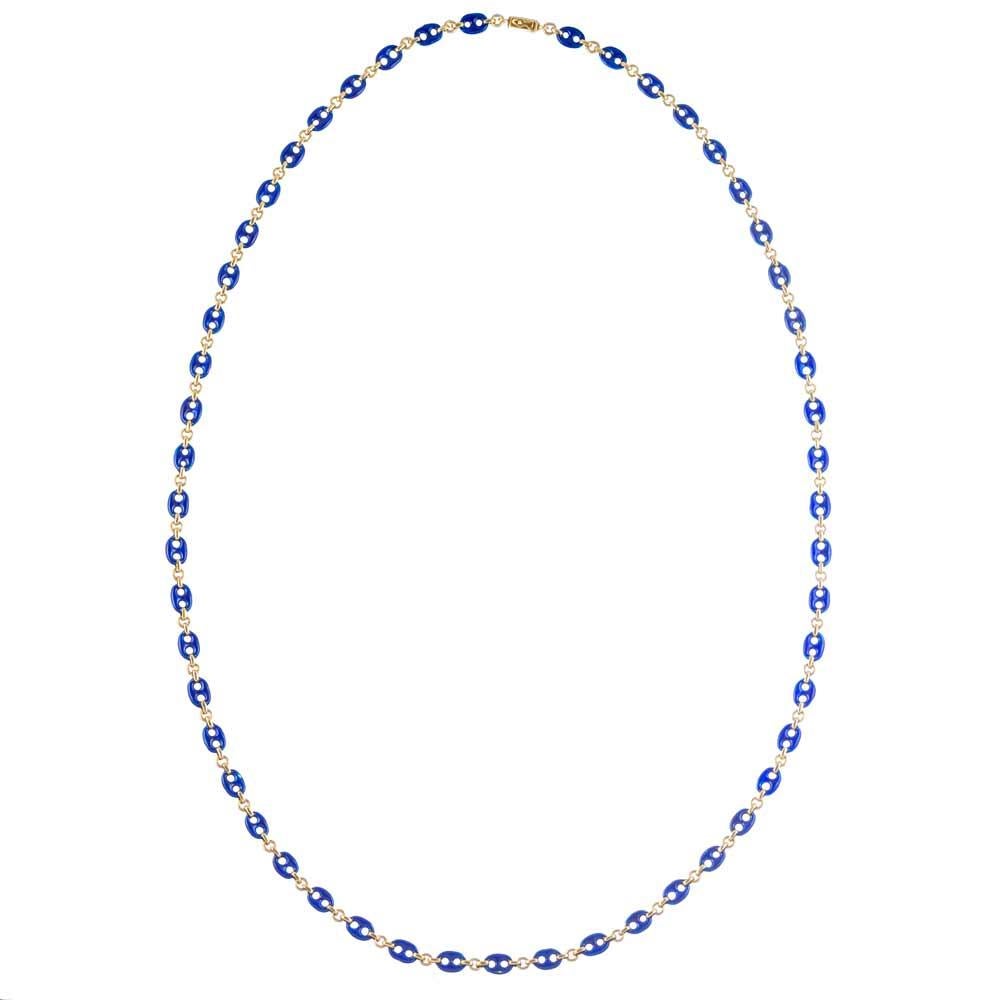 This 36 inch chain combines royal blue enameled links with golden connections in a style which was certainly inspired by the iconic design made famous by Gucci. The absence of diamonds or other gemstones makes this piece extremely wearable for all