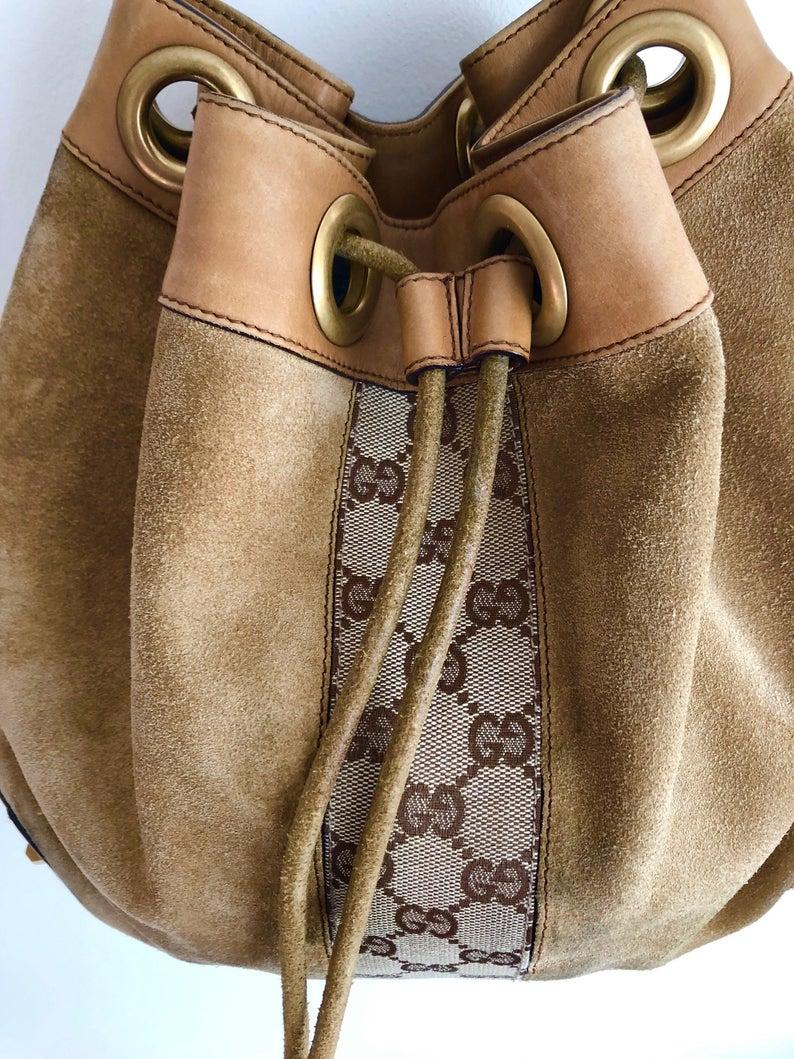 GUCCI suede and leather drawstring bag In Good Condition In London, GB