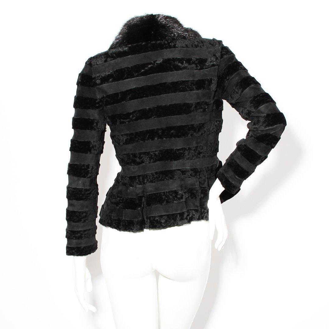 Product Details:
Suede and mink collar jacket by Gucci 
Fur and leather stripes 
Mink collar 
Zip up front closure
Ruffle bottom hem
Gold tone hardware
Made in Italy 
Condition: Great, little visible wear. Small hole in left arm. (see photos)