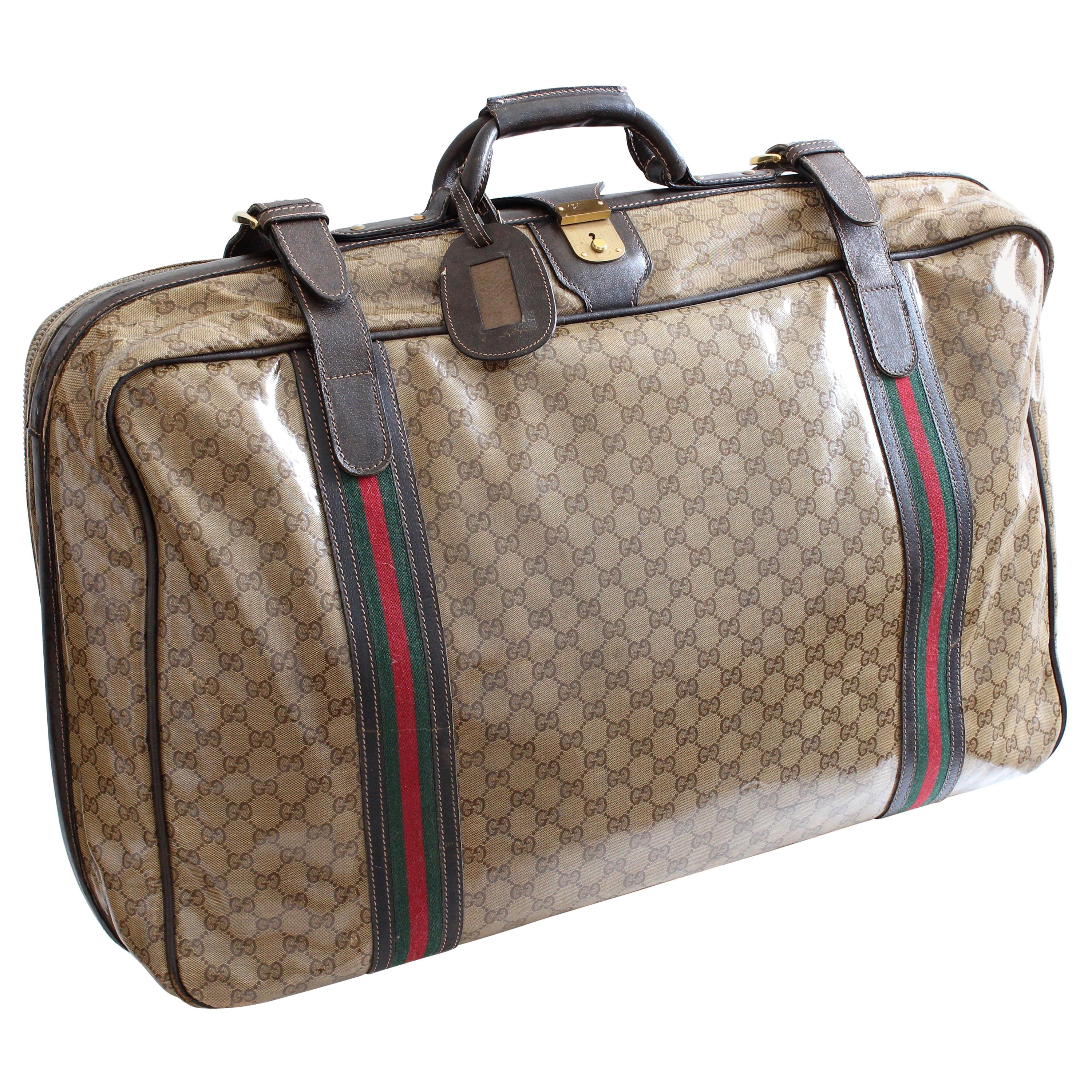 gucci travel luggage