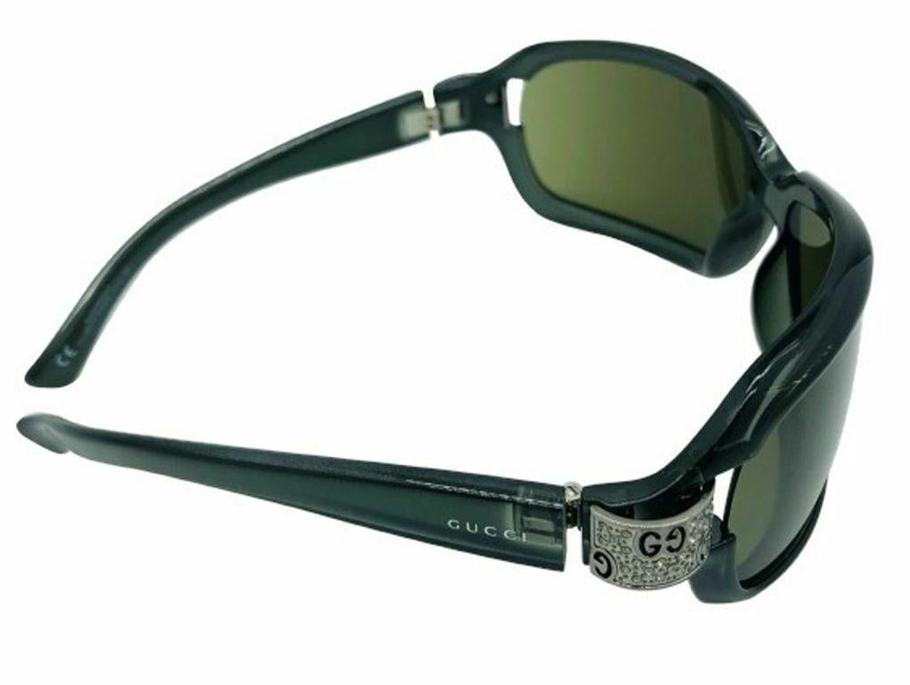 A lovely pair of Gucci sunglasses with GG crystal studded detail on the sides. A preloved pair in excellent condition.

BRAND	
Gucci

ACCESSORIES	
Case, Cleaning Cloth

COLOUR	
Black

CONDITION	
Used – Excellent

FEATURES	
Crystals on sides, GG