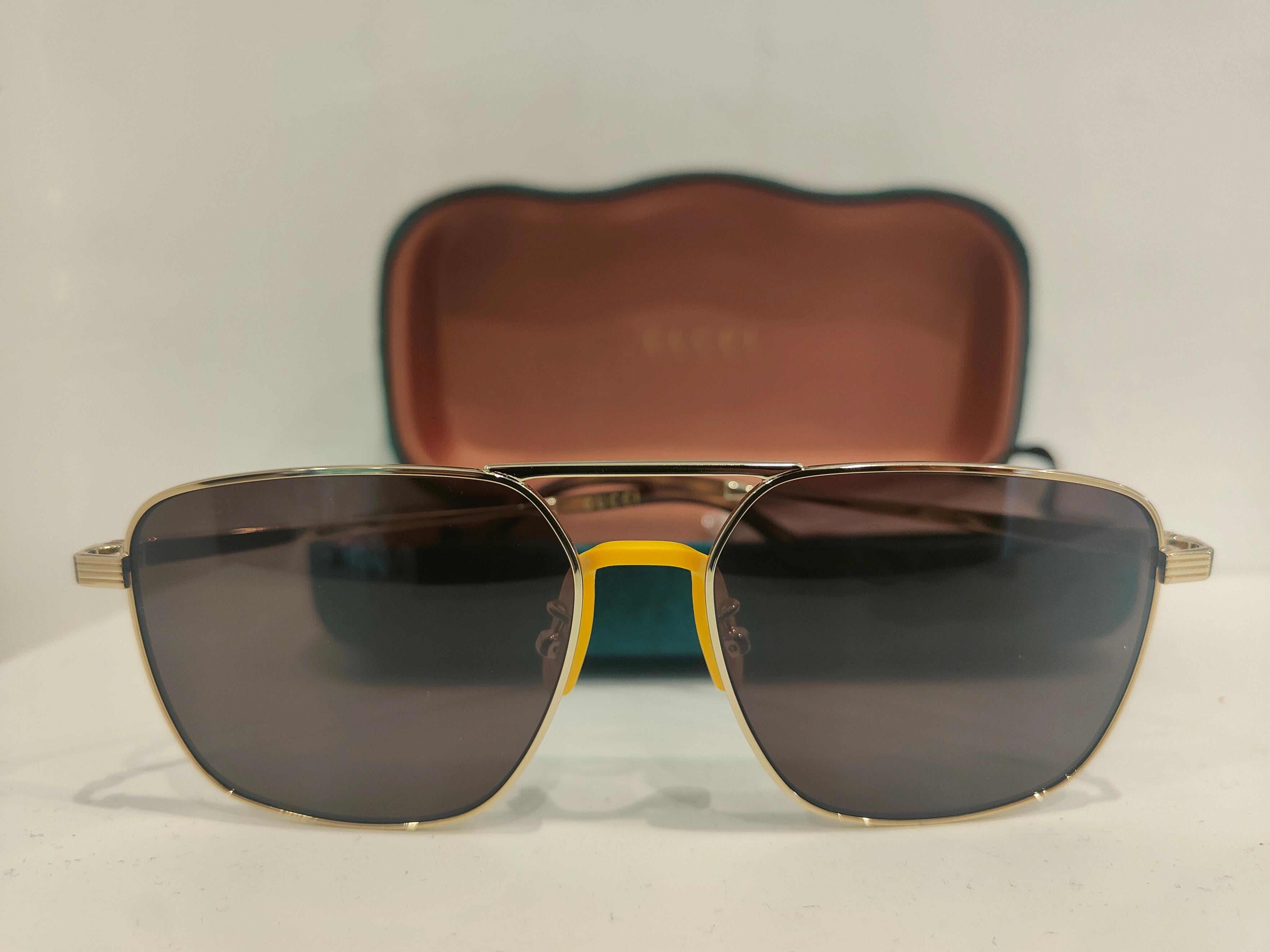 Gucci sunglasses NWOT and box 2