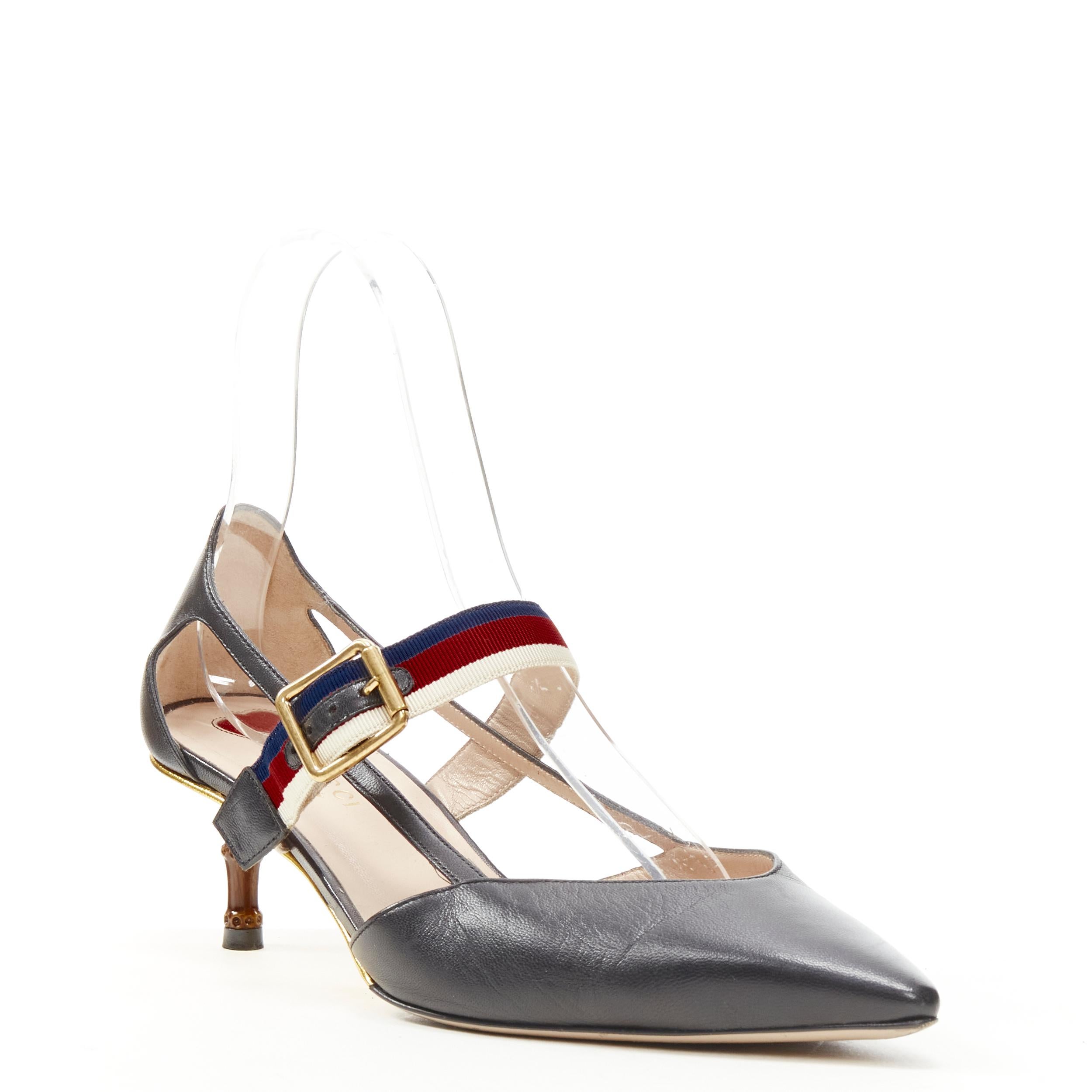GUCCI Sylvie black leather web strap bamboo heel cut out pump EU38.5 
Reference: KEDG/A00137 
Brand: Gucci 
Designer: Alessandro Michele 
Model: Sylvie pump 
Material: Leather 
Color: Black 
Pattern: Solid 
Extra Detail: Sylvie web bucked strap in