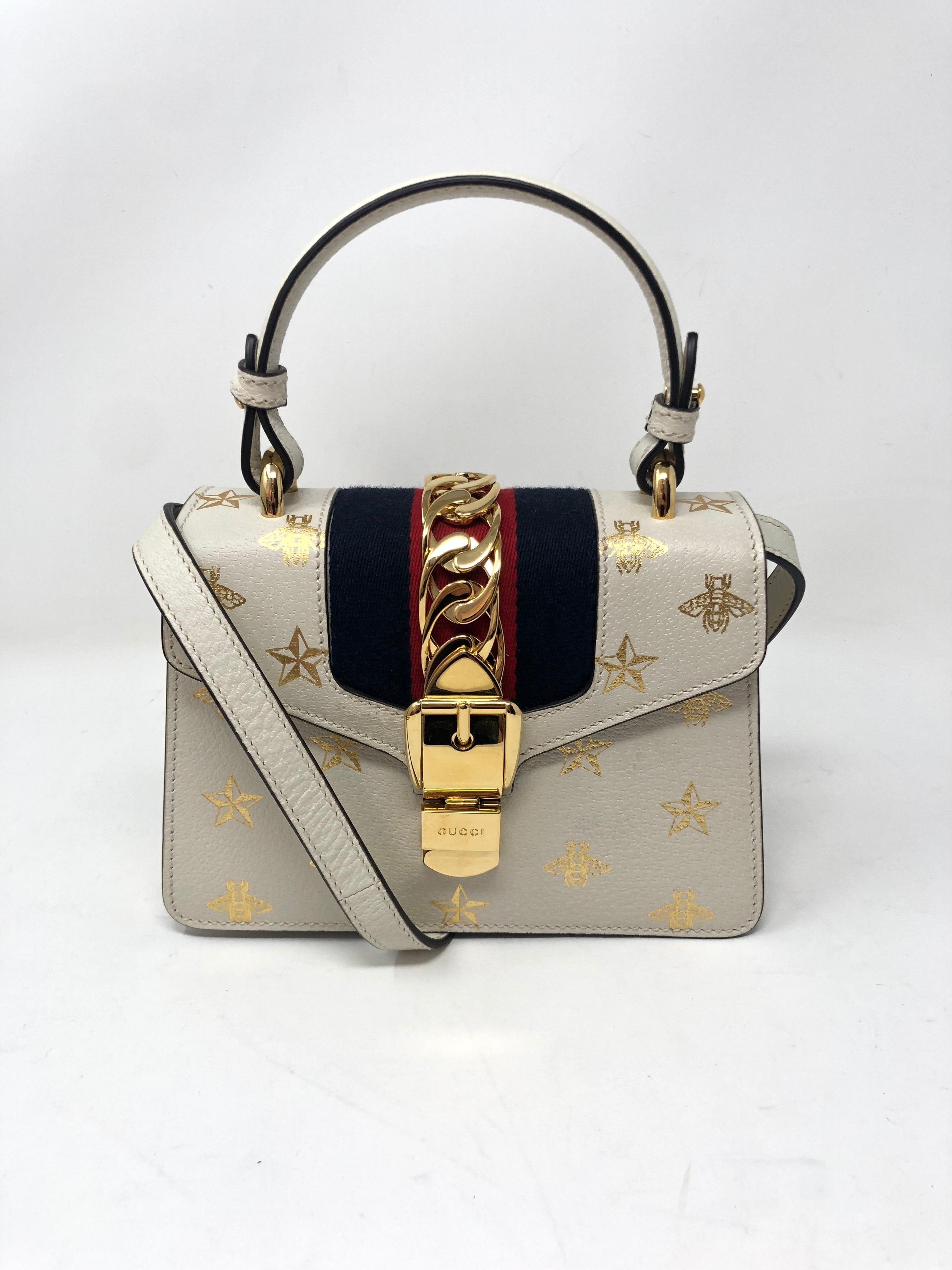 Gucci Sylvie Limited Edition Bag. Insects and Stars rare bag. Brand new condition. Comes with 2 different straps. Can be worn crossbody or as a top handle bag. Guaranteed authentic. 