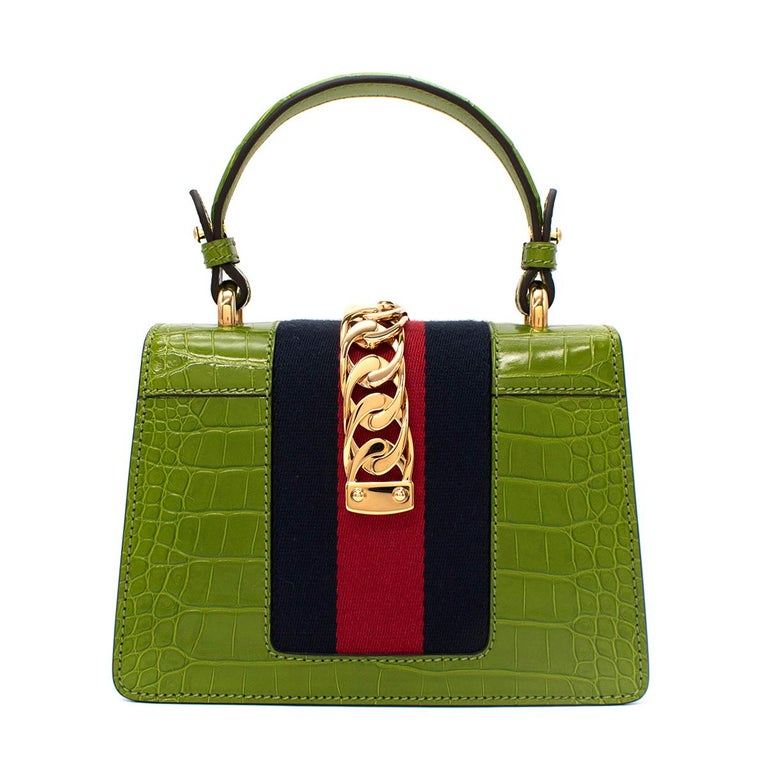 Gucci Sylvie Mini Chain-embellished Alligator Shoulder Bag For Sale at  1stDibs | gucci sylvie bag mini, 新小平駅から吉祥寺駅, gucci sylvie bag