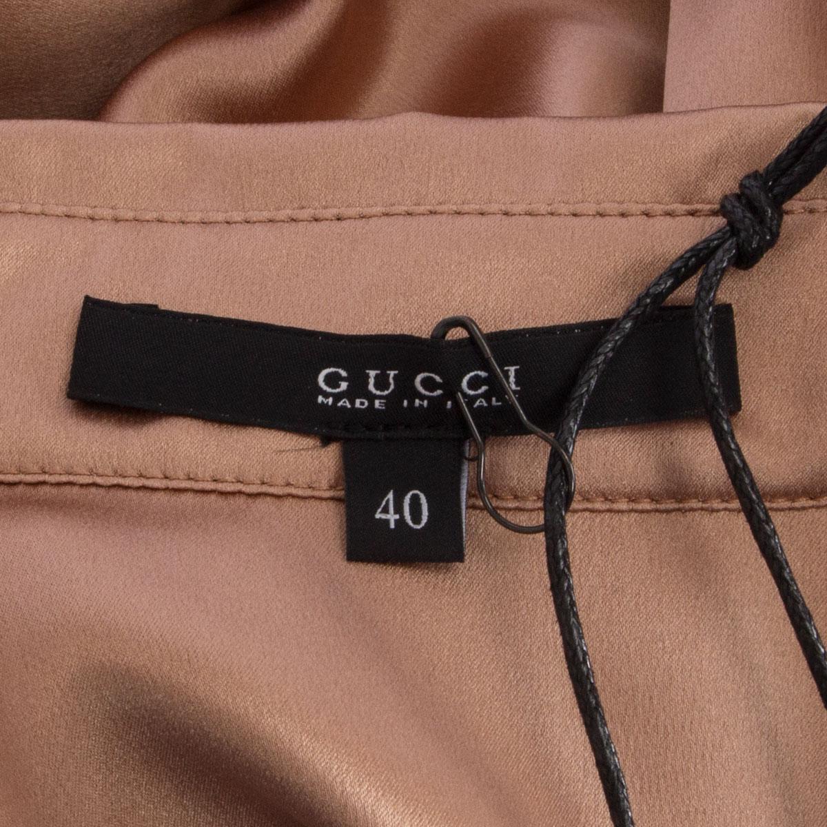tan gucci shirt