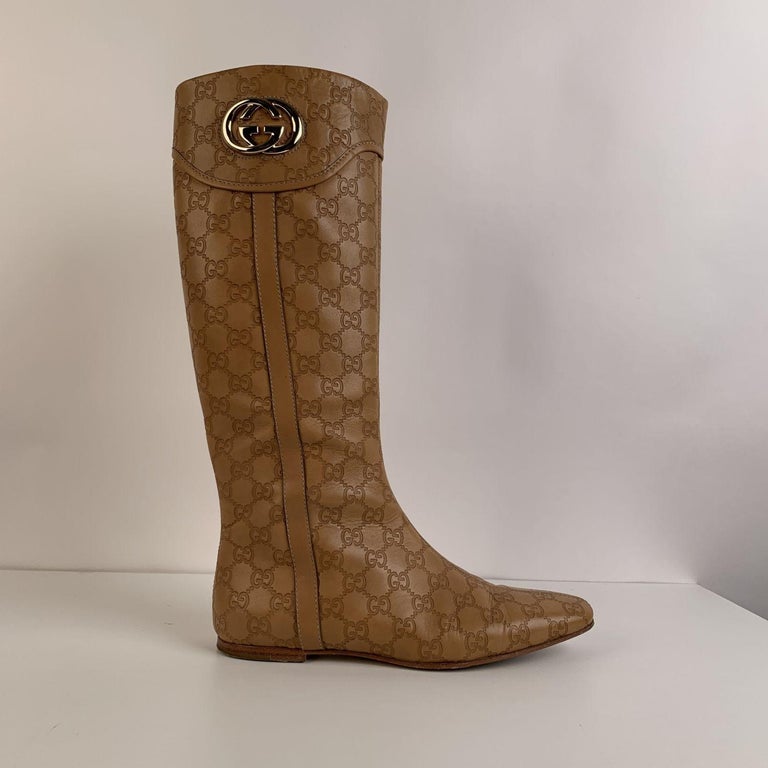 Gucci Tan Whisky Guccissima Leather Britt Flat Boots Size 39 C For Sale at  1stDibs