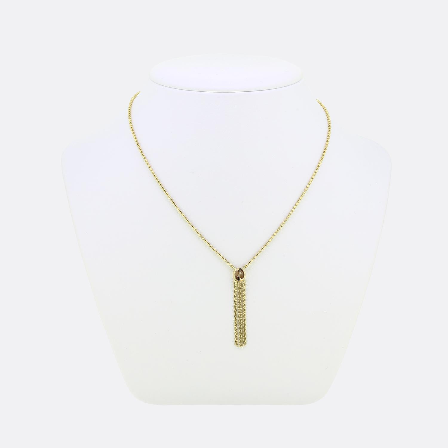 Here we have a tassel pendant necklace from the world renowned luxury designer, Gucci. This piece has been crafted from a rich 18ct yellow gold with the pendant forming the iconic double G logo shape which, in turn, plays host to 6 freely suspended