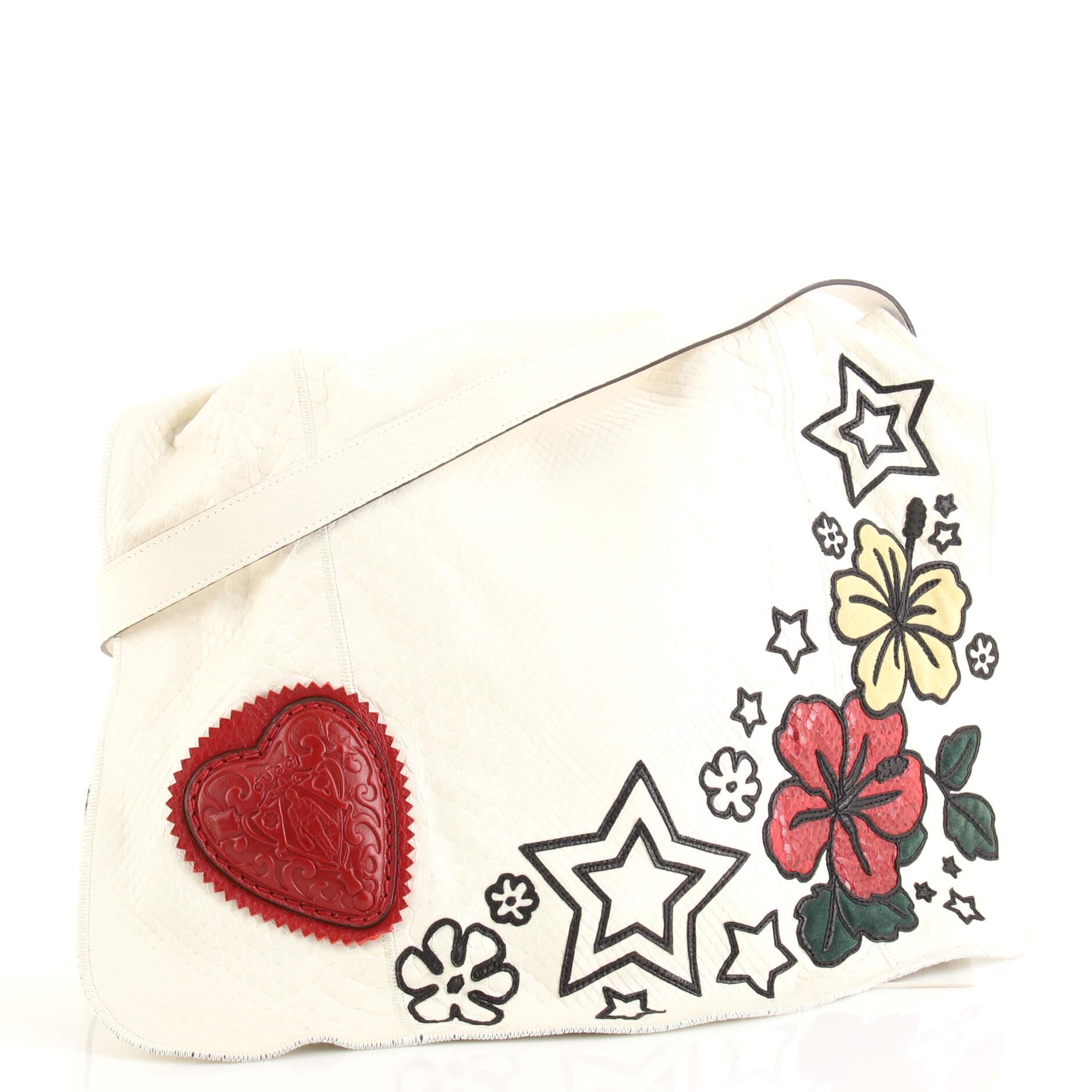 This item can only be shipped within the United States.

Condition: Very good. Odor in interior. Moderate wear, marks, creasing and slight discoloration on exterior, strap and underneath flap, minor wear in interior, scratches on