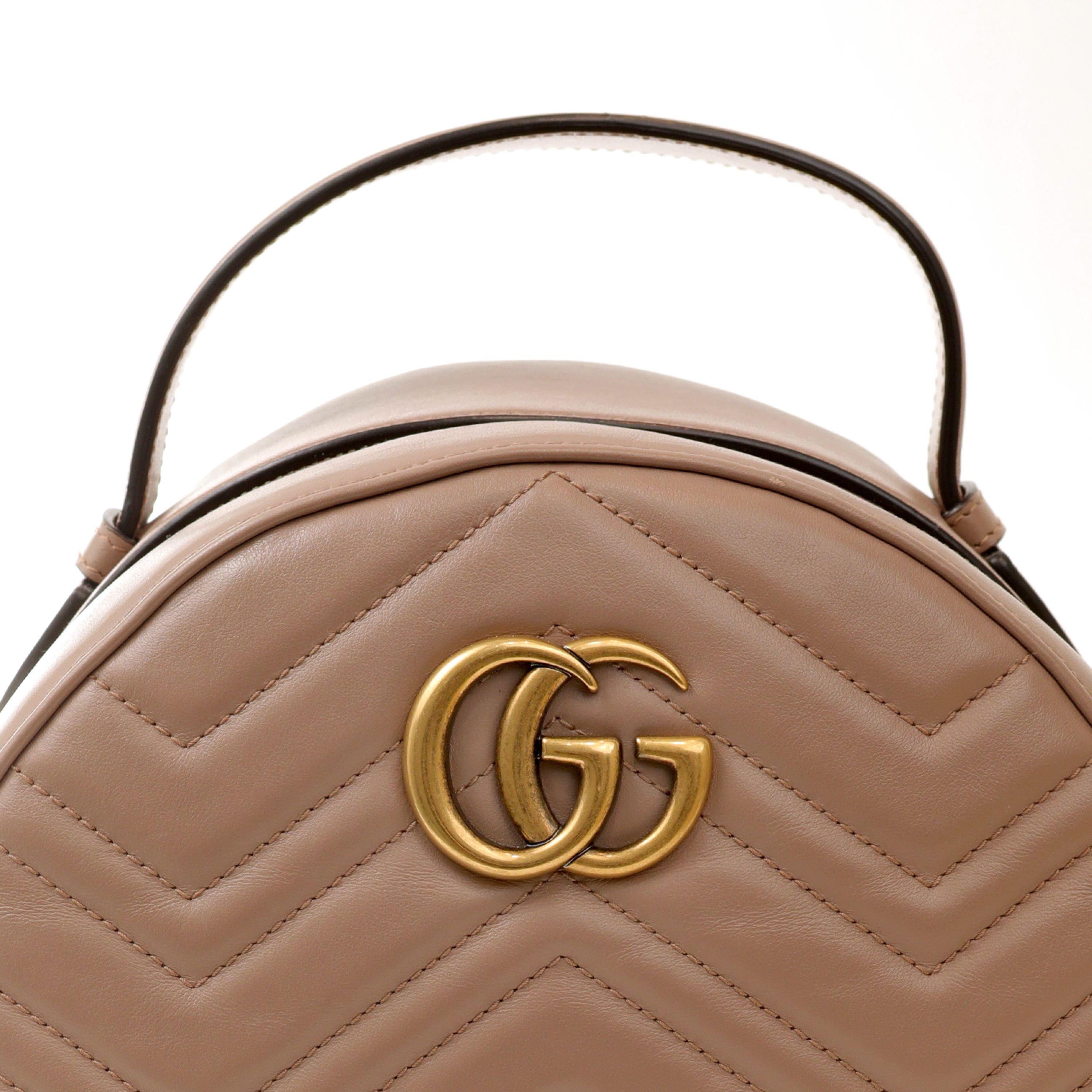 Gucci Taupe Leather GG Marmont Backpack with Gold Hardware In Excellent Condition In Palm Beach, FL