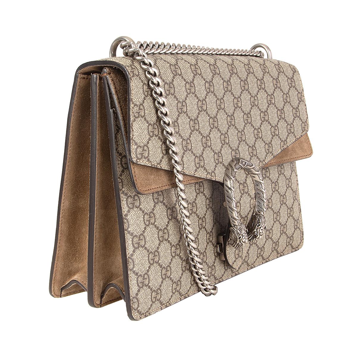 Gucci 'Medium Dionysus' shoulder bag in taupe suede and GG Supreme canvas. Textured antique silver-tone tiger head closure-a unique detail referencing the Greek god Dionysus. Sliding chain strap can be worn multiple ways, changing between a shoulder