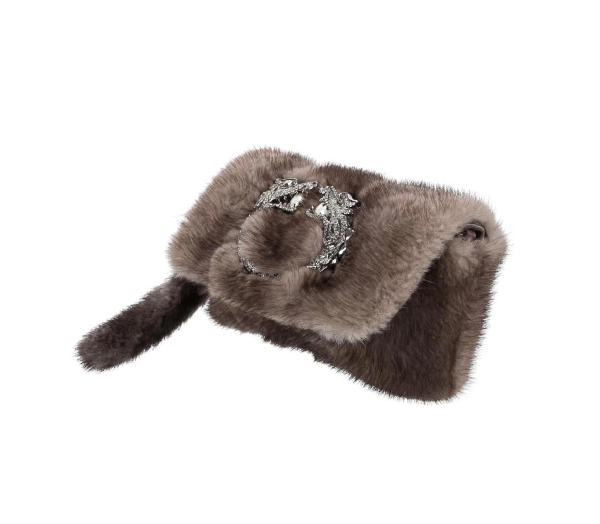small tan clutch bag