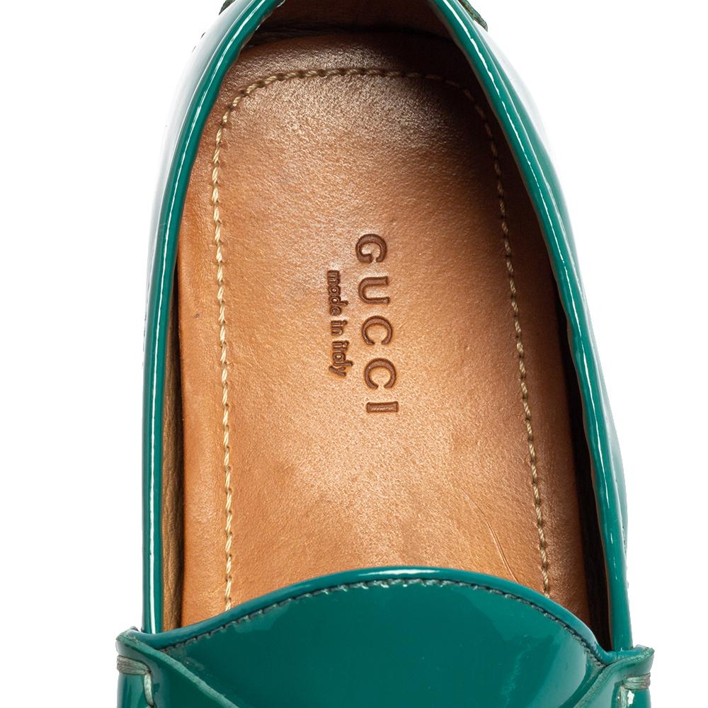 Exquisite and well-crafted, these Gucci loafers are worth owning. They have been crafted from patent leather and they come flaunting a teal green shade with the iconic Horsebit detail on the uppers. The loafers are ideal to wear all day.

Includes: