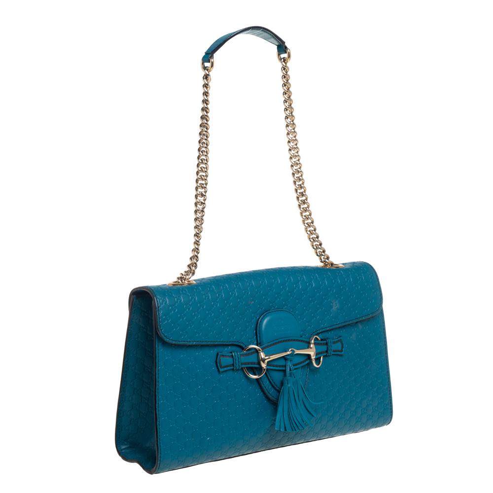 teal gucci purse