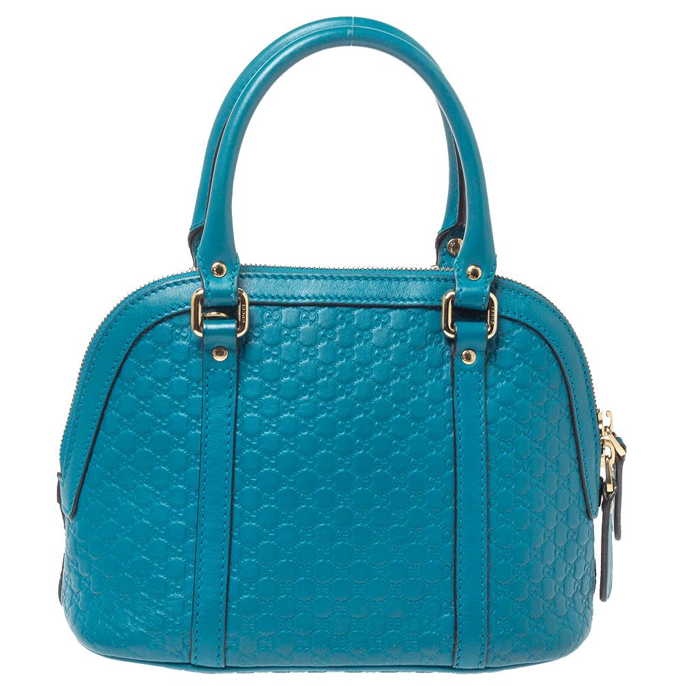 Modernize your choice of accessories by adding this Microguccissima leather satchel to your collection. Stow all your everyday essentials in the canvas-lined interior of this stunning piece. The eye-catching creation by Gucci is an exemplar of