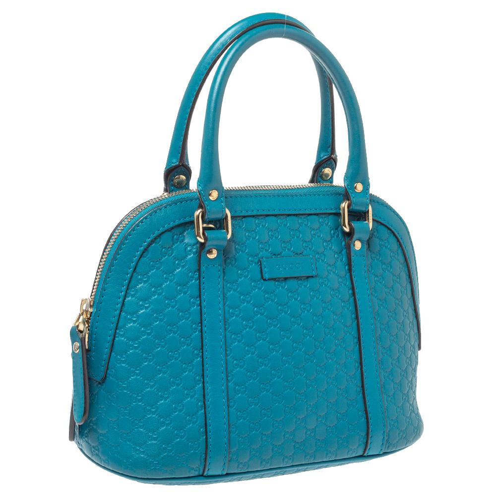 teal handbags leather