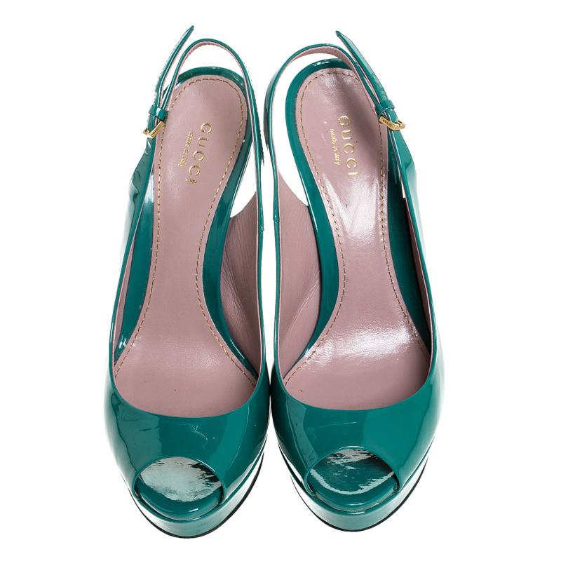 Made from well-crafted patent leather, these sandals are a splendid example of luxury and class. A pair of stunning Gucci sandals like this one is a closet must-have. They feature peep-toes, slingbacks and XXX cm heels.

Includes: Original Dustbag,