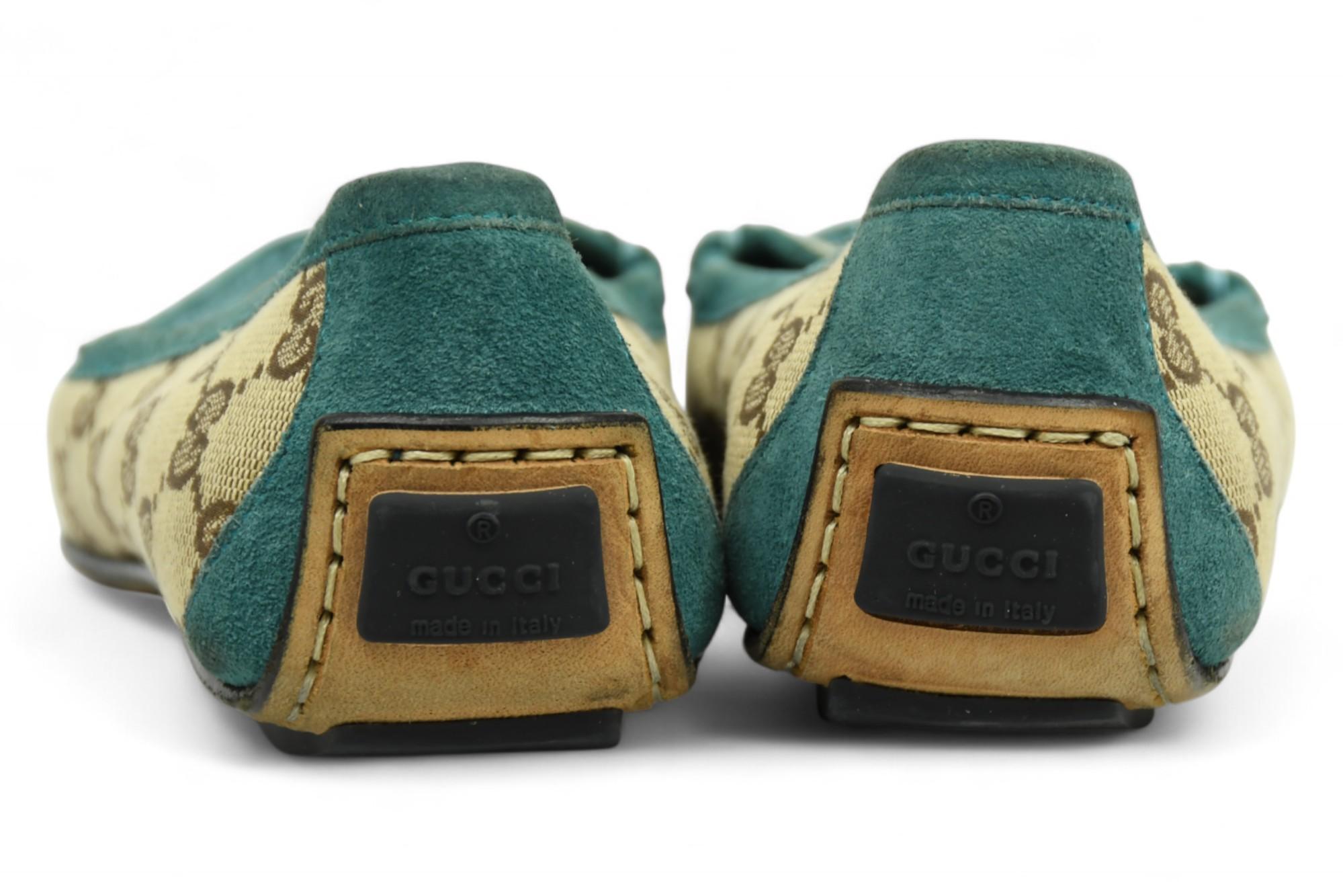 Women's Gucci Teal Trim Monogram Loafers  Size 6.5 US For Sale