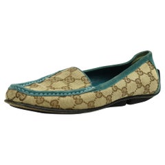 Mocasines con monograma y ribete verde azulado de Gucci  Talla 6.5 US