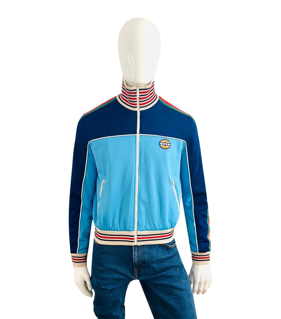 Brand New - Gucci Technical Jersey Web Stripe Track Jacket

Bi-colour, zip-up jacket  in navy and blue, imbued with vintage, sportswear inspired feel.

Detailed with iconic red and green ribbon web stripe down the sleeves and interlocking 'GG' logo