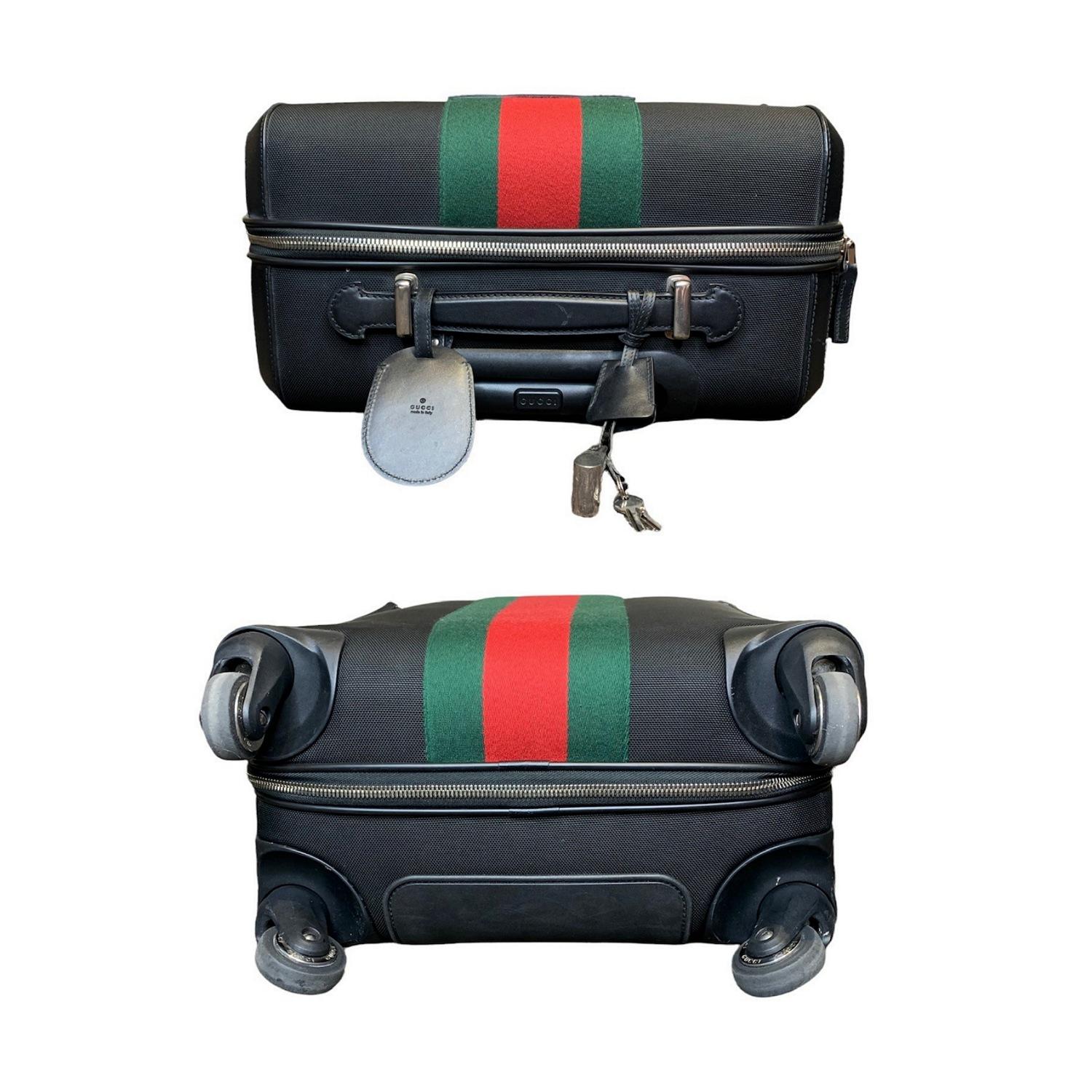 gucci suitcase with wheels