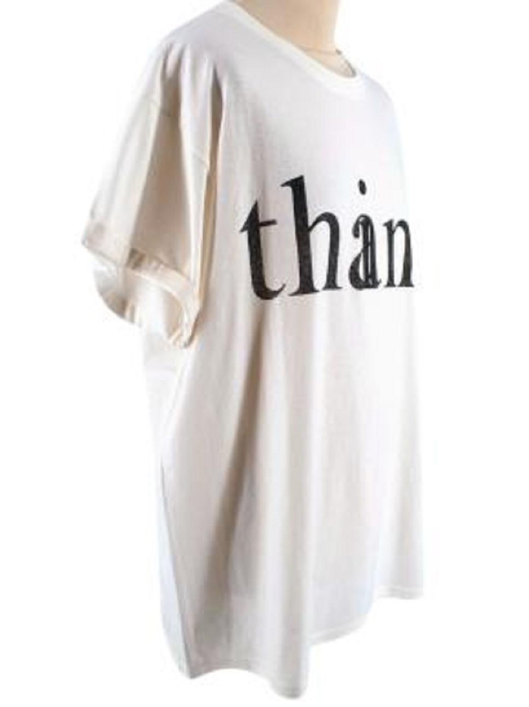 Gucci Cream Black-text T-shirt

- Short sleeved
- Round and ribbed neckline
- Slight distressed hem detail
- Black text print on chest
- Text print on back
- Folded cuffs detailing

Material
100% Cotton

Made in Italy

PLEASE NOTE, THESE ITEMS ARE