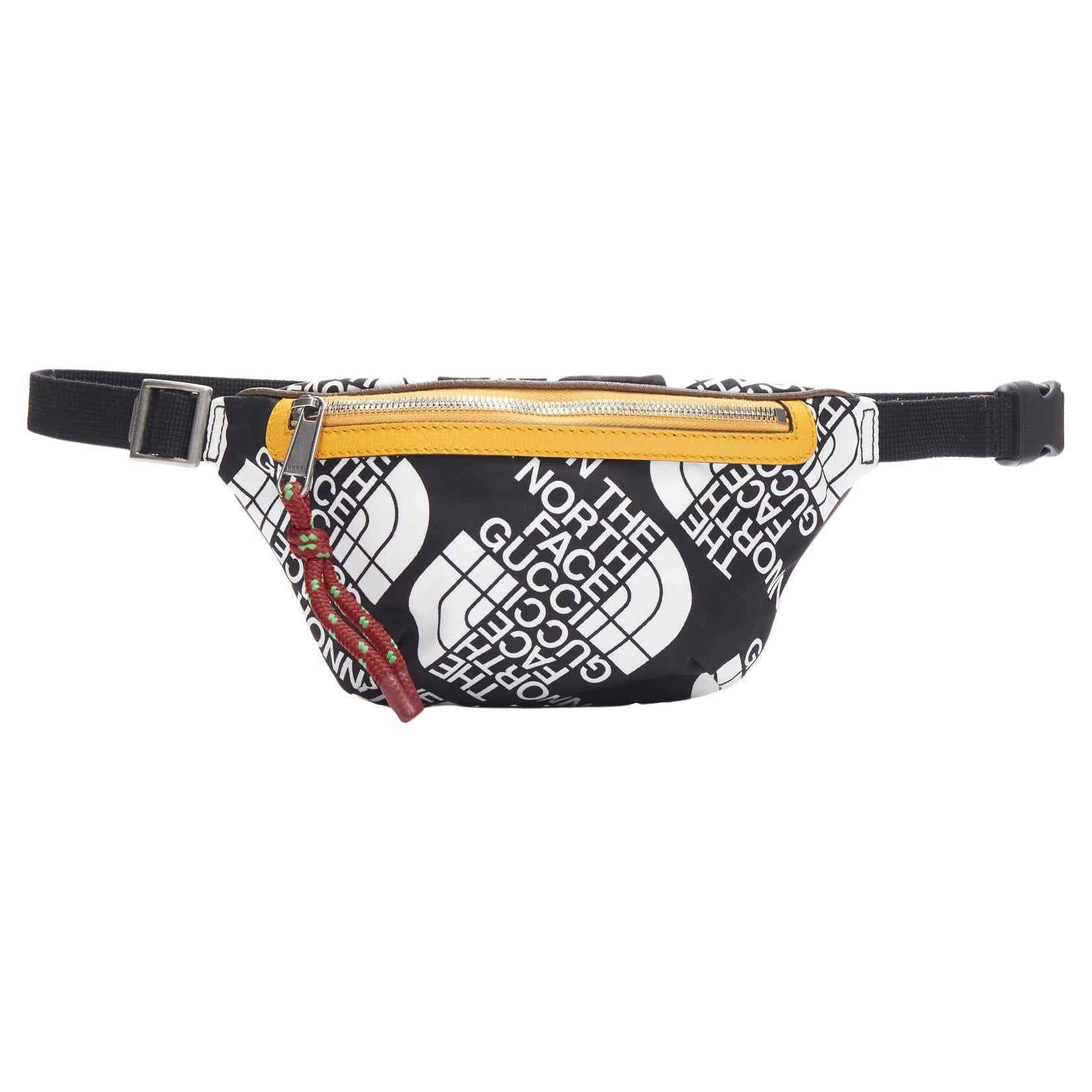GUCCI The North Face black white monogram yellow zip belted waist bag For Sale