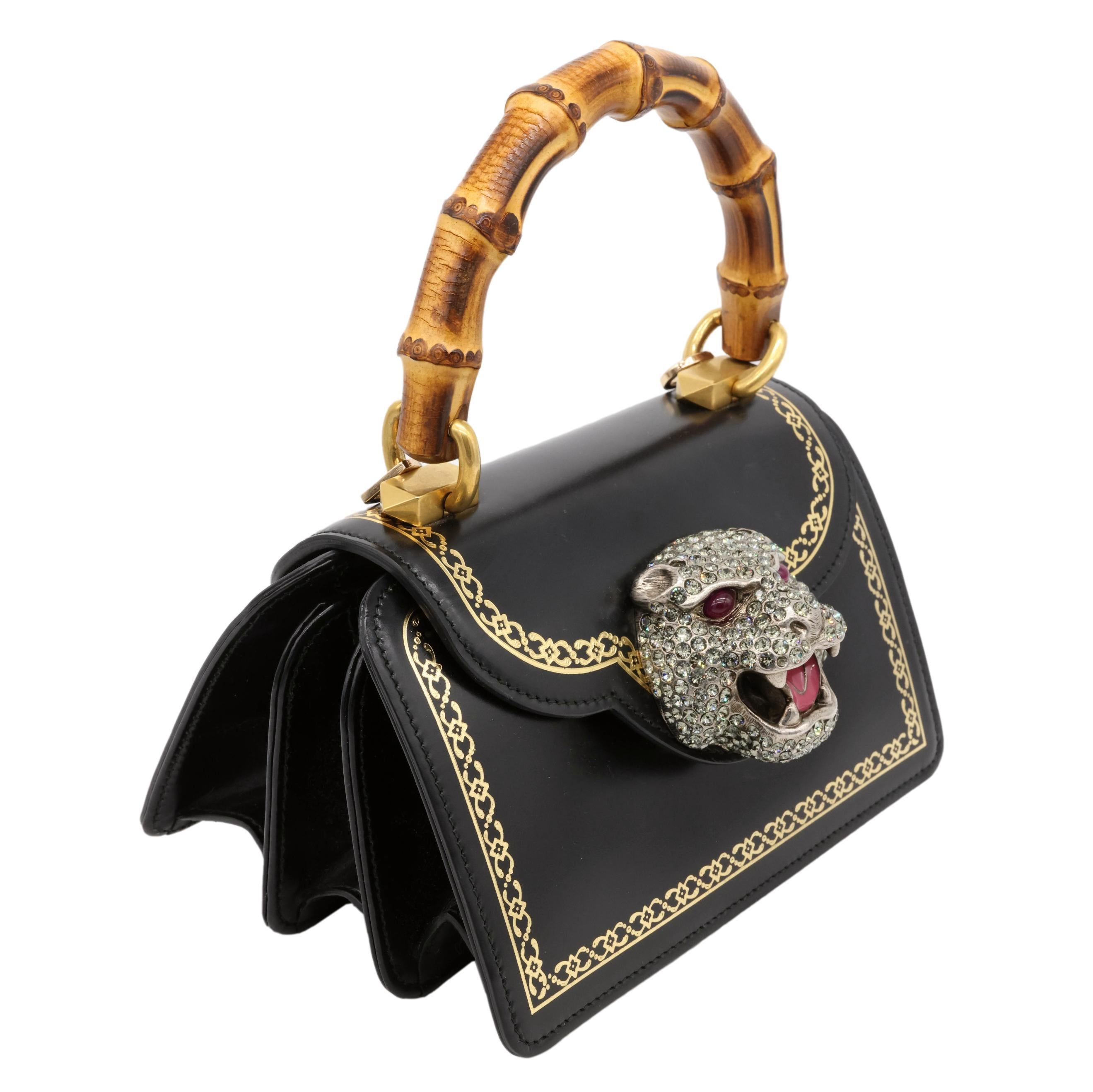 Gucci Mini Thiara Black Leather Bamboo Top Handle Shoulder Bag, 2018. First introduced in the early 1940's, the Gucci bamboo bag came into production as materials throughout Europe became scarce. Bamboo, which could still be abundantly sourced from