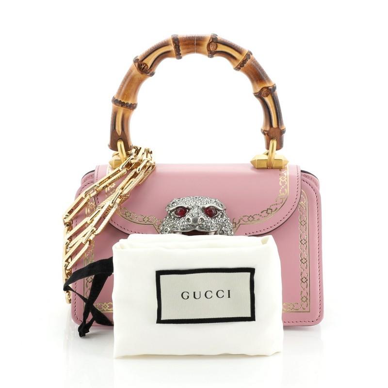 gucci frame print leather top handle bag