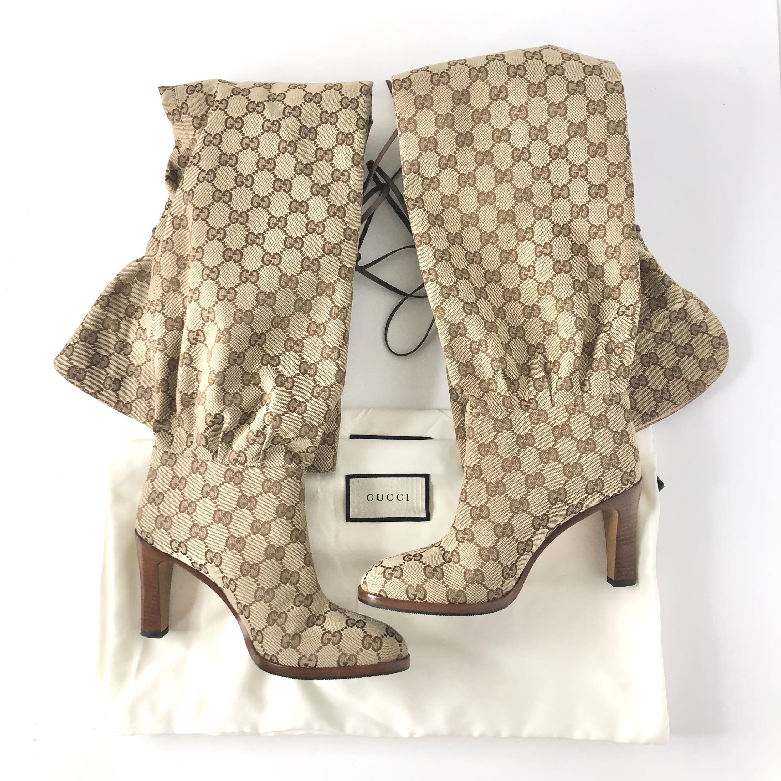Gucci Slouch GG Monogram Thigh High Boots
Includes dustbags
Size 37EU
Color Multi
Fabric upper
Leather and rubber sole
Drawstring at shaft
Pull on style
Round toe
Signs of light use, overall very good preowned condition

gg, double g, authentic,