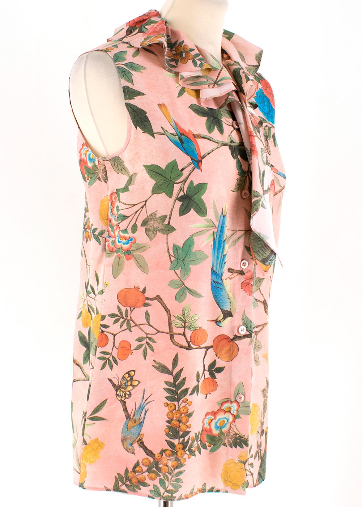 Gucci Tian Print Sleeveless Silk Top

- Floral pattern silk top
- Sleeveless
- Button up fastening to the middle front
- Light collar with possible bow

Please note, these items are pre-owned and may show some signs of storage, even when unworn and