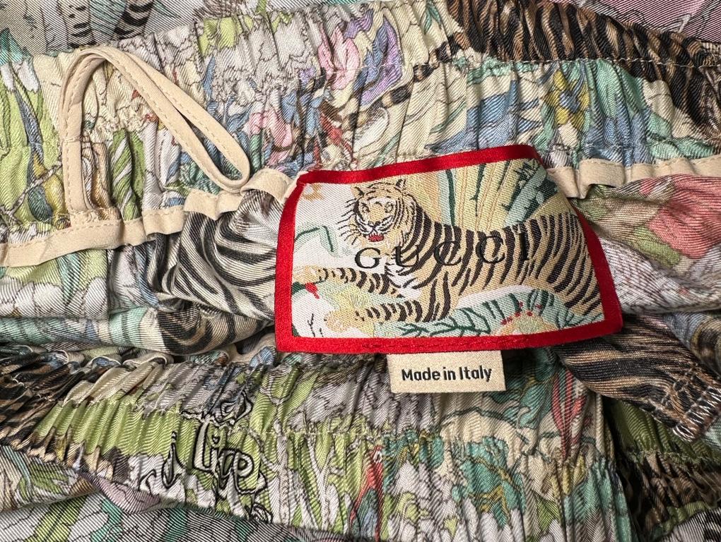 A beautiful skirt for sale made by Gucci - a Tiger Silk Skirt. The print is just exquisite on this preloved item, which has been used less than a handful of times. The skirt is in excellent condition and has plenty of wear left. Made in a size